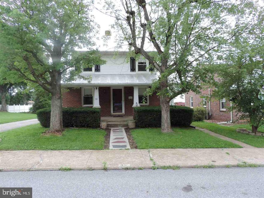 Inviting all brick cape cod w/covered front & back porches. Detached oversized 1 car garage. Nice fenced yard. Inside you will find the living room and family room with wood floors. Dining room, kitchen and the mud room have newer laminate flooring. Two of the Bedrooms with wood floors. Insulated windows. Come and enjoy!