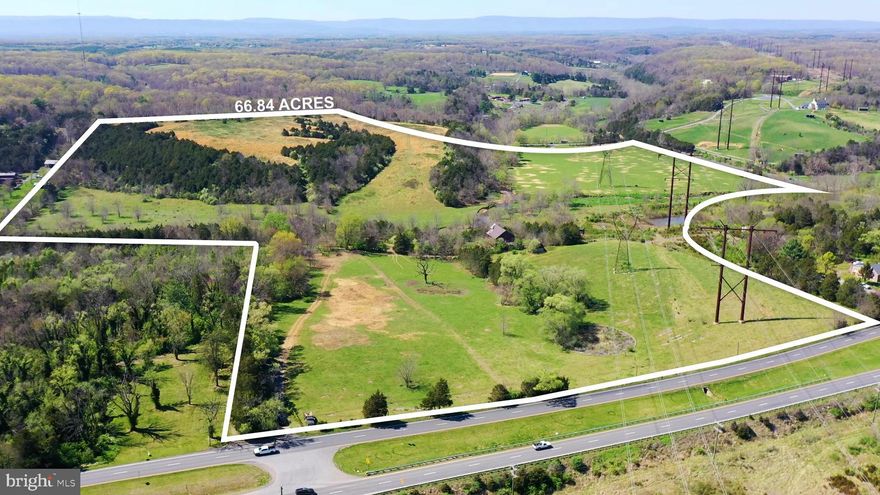 *FUTURE USE is Commercial, currently zoned A* Check out the drone video*This would be the perfect spot for a Brewery/Distillery. Multiple uses for this sprawling 66.84 acre property boasting a prime location along the highly trafficked US RTE 340/522 corridor, which has been experiencing major growth in recent years. Currently zoned agricultural, the property's FUTURE USE is Commercial, making it an ideal investment opportunity for businesses looking to capitalize on this area's bustling economy. With almost 800 feet of road frontage on US RTE 340/522, this property offers unparalleled visibility and accessibility. Additionally, the town has agreed to provide water and sewer hookups if the property is rezoned to Commercial ONLY, making it even more attractive for commercial use. The property features two access points, one off 340/522 and the other off Ritenour Hollow Rd, and boasts several amenities including pastures, two streams (Molly Camel Run & Crooked Run), and several old barns. One of the most impressive features of this property is the SPECTACULAR views on upper field, offering a breathtaking backdrop for any future development. Currently, only cattle graze this property, ensuring a clean slate for any potential buyer's vision. It's important to note that the property is currently in land use, resulting in low taxes. However, the buyer would be responsible for any roll back taxes.  Lastly, it's important to be aware that a portion of the rear property is located in a flood zone. Overall, this property is a rare opportunity to own a large parcel of land in a highly desirable commercial area. With its prime location, versatile zoning potential, and natural amenities, it's a blank canvas ready for any buyer's imagination.
