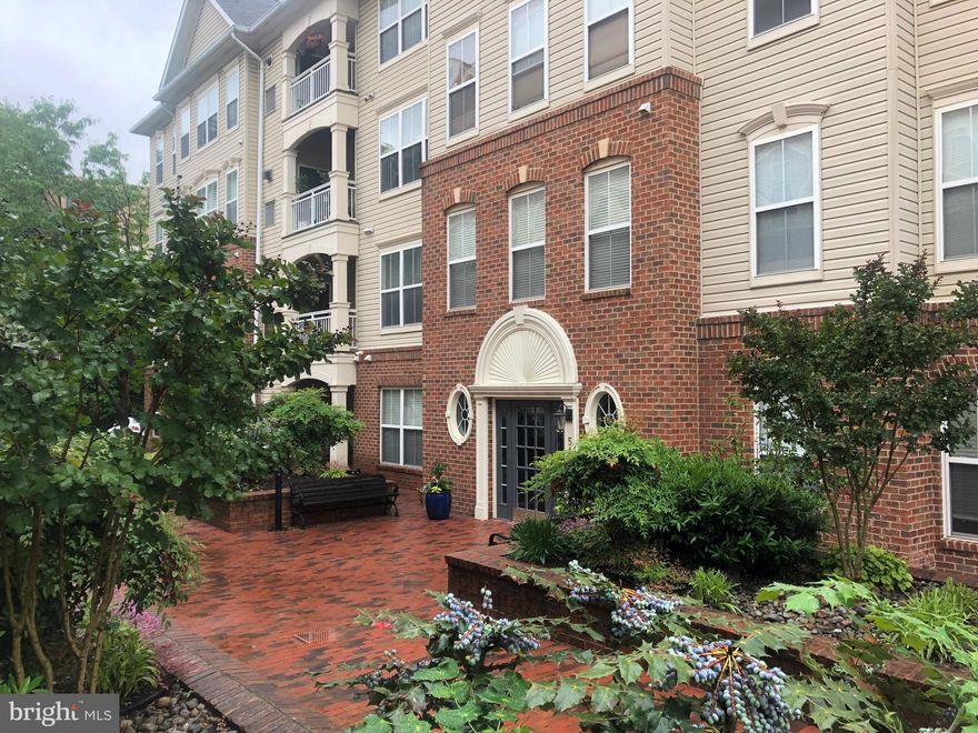 Granite being installed next week!!! One of the largest 1-Br's in Cameron Station!  New engineered cherry flooring Living/Dining.  New Stainless Steel Appls.  . Tall ceilings, Gas Fireplace, Stack W/D.  Nice balcony for enjoying a glass of wine!