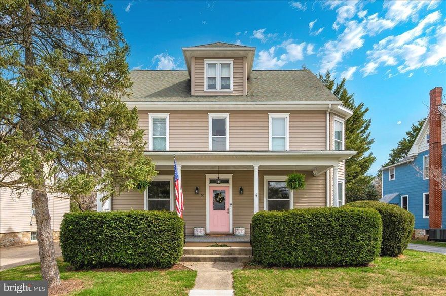 A stunning turn-of-the-century home seamlessly blending historic charm with modern conveniences in the heart of Downtown Walkersville! This move-in-ready beauty boasts a classic floor plan featuring original woodwork, hardwood floors, and an updated primary bathroom. The spacious, light-filled interior includes a generous living room, family room, dining room, and a full bath on the main level.
Upstairs, you’ll find large bedrooms, including a well-appointed primary suite with a generous built-in closet. A walk-up attic offers excellent potential for additional living space. The fully finished walk-up basement, complete with LVP flooring and a full bath, makes for a perfect in-law suite or potential 5th bedroom. Dual-zoned HVAC ensures year-round comfort.
Enjoy relaxing on the expansive Trex-decked front porch or hosting gatherings in the private backyard, which features a partially covered flagstone patio. The property also includes a detached one-car garage, maintenance-free outbuildings with electricity, and a charming historic outhouse. This home is the perfect blend of history, character, and modern comfort—don’t miss this incredible opportunity.