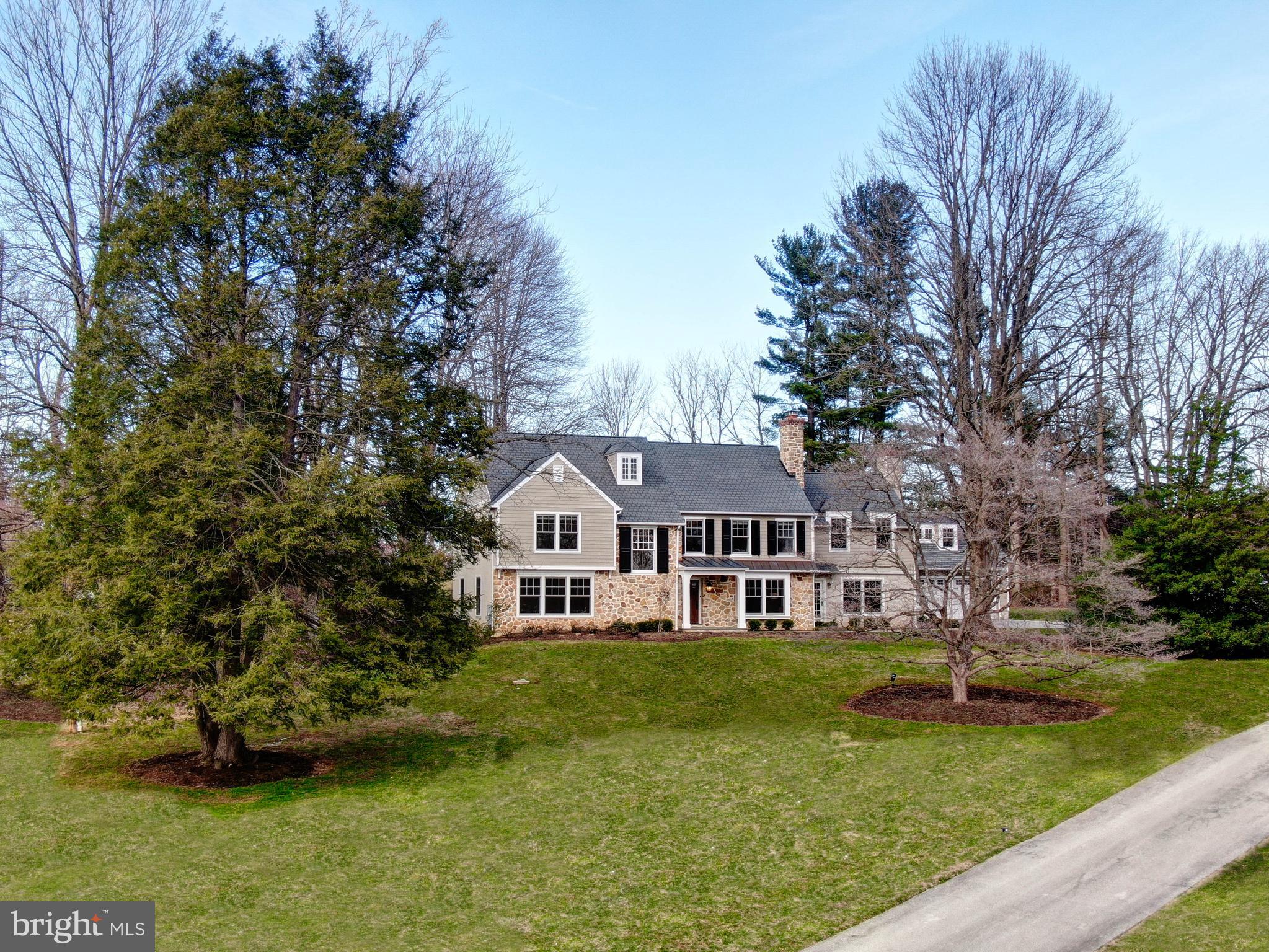 BETTER THAN NEW CONSTRUCTION and NO ASSOCIATION FEES! This fabulous Colonial Farmhouse was designed by Anne Ledger and rebuilt from the ground up in 2006, lovingly restored and cared for by the current owners since 2016, including the design and build of an over-sized 2-story 3-car Garage seamlessly attached by a breezeway in 2017! NO EXPENSE WAS SPARED! The home shows like a model and includes every detail and amenity today s discerning buyers are looking for! All over-sized double hung windows, accent windows galore, solid wood interior doors, beautiful moldings and built-ins, and the finest systems, fixtures, and appliances! The interior features include stunning Brazilian floors, open concept living with a state-of-the-art granite Kitchen with antique white cabinetry and top-of-the-lineappliances, Butler s Pantry, fireside Family Room, Mudroom, formal Living and Dining rooms, an additional Sitting Room with an over-sized fireplace, convenient Study, 2 Powder Rooms, his & hers Master Bathrooms connected by an over-sized walk-in shower, newer high end carpeting in the bedrooms, 2nd floor exceptional Laundry Room, walk-up floored attic already plumbed, large finished basement space, the list goes on...! The exterior of this remarkable home is finished with Pennsylvania field stone, Hardie Board cement siding, paver and flagstone walkways, a large flagstone terrace accented with bricks, large yard and beautiful rolling landscaping! The Garage boasts a clear span first level that is heated with an epoxy floor and an entire walk-up 2nd level with dormer windows. Property backs toSpringhouse community and is conveniently located near all the new shops and restaurants Newtown Square has to offer, just a quick drive to the Episcopal Academy and downtown Wayne! Relocation is the ONLY reason this home is available! Don t miss this once-in-a-lifetime opportunity!