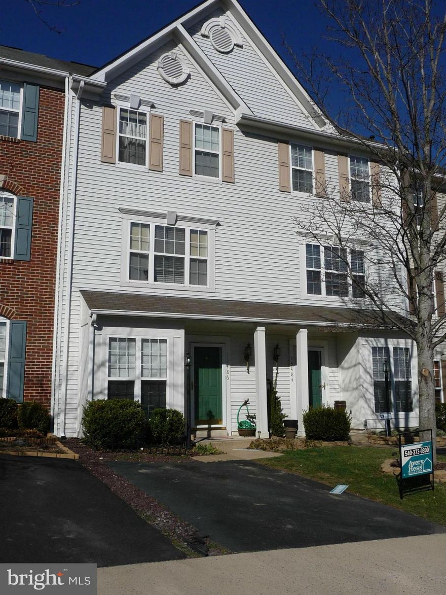 Lovely 3 level 3 bed, 2 bath townhouse.  Box-bay window- living room,  kitchen with hardwood floors, fireplace in family room, vaulted ceiling in Master, luxury master bath with soaking tub, separate shower, large patio, NEW ROOF.  HVAC system, water heater and attic fan(lifetime warranty)--all new in 2013.  Refrig., dishwasher-2012. Carpets--subsidy considered.  DR lamp pictured does not convey.