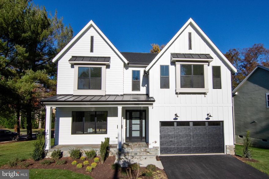 Fully complete and ready!! This brand new BeaconCrest Home is conveniently located in the heart of Vienna on an oversized 17,000 square foot lot. With over 5,500 finished square feet of luxurious living space this farmhouse-inspired design greets you with a covered front porch that effortlessly creates remarkable curb appeal. Upon entry, you are welcomed by a beautiful, bright, and open foyer with an adjacent bonus room, equipped with a charming window seat and spacious storage - perfect for a home office. This open layout features an oversized family room adjacent to a gourmet  kitchen, and dining area that all flow together as one. Immediately accessible from the family room is a spacious covered deck overlooking the rear yard. Last but certainly not least, discover the tucked away gourmet scullery kitchen, ideal for entertaining, convenience, and practicality. The second level offers an abundance of space and livability with  a bonus loft space ideal for work, play, or relaxation. The  sumptuous and bright owner’s suite features a dramatic tray ceiling, walk-in closets and an indulgent bath retreat that includes an oversized  walk-in shower, custom built-in, and private water closet. Bedrooms two and three share the expertly designed buddy bath, and offer individual walk-in closets. Bedroom four offers a sunny window seat, en-suite bath, and of course walk-in closet.  A lower level ideal for entertaining offers a generously sized recreation room with full size windows, wet bar and direct walk-out access to the outdoor living space.  A fifth bedroom on this lower level is complete with a walk-in closet and a full bath. Do not miss this opportunity.