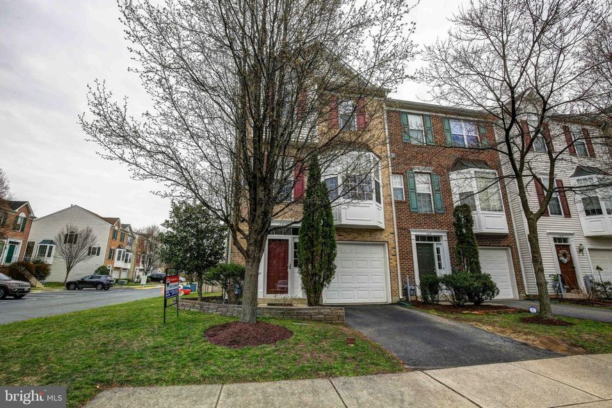 Pottery Barn Perfect!  This home, located on the corner lot on a dead-end street, has been lovingly maintained and updated.  You'll see attention to detail everywhere you look.   One thing you'll notice is this particular location is ideal if you like a lot of light coming in your home.  You enjoy much more light than normal because of the way the home faces, from the front and back and the extra-long windows, almost floor to ceiling.  The end unit model also has extra windows on the side that bring in even more natural lighting.  As you come through the front door, you'll see the lower level is a recreation room with a sliding glass door leading out to the extra-large, flat, fenced backyard.  On this level you also have a powder room, laundry, and storage.  The washer and dryer will stay with your home.  Upstairs  is the sought-after layout with the stairs leading out to the living room that features hardwood flooring, a gas fireplace with mantle, crown moulding and another sliding glass door leading out to your deck.  There is a cutout between the living room and kitchen which gives it a more open feel.  The large, gourmet kitchen has a large pantry, stainless steel appliances, and space for a table and chair set.  There is another powder room on this level next to the kitchen.  Upstairs is the huge master suite that has a deck off it to enjoy your coffee in the morning or gaze out onto the stars at night.  The bathroom is enormous with a garden tub under the window, and separate shower.  You'll also love the walk-in closet!  There's another full bathroom in the hallway and two extra spacious bedrooms.  This neighborhood has two outdoor pools to choose from, tennis courts and tot lots and the Nantucket Elementary school is right down the street.   This home is slated to go to the new Crofton High School too.   Across Route 3 is the two large Waugh Chapel shopping centers for shopping, gym, movies, Wegmans, restaurants and more!  Centrally located to  Washington DC, Baltimore, or Annapolis,  it's easy to get to wherever you need to be!