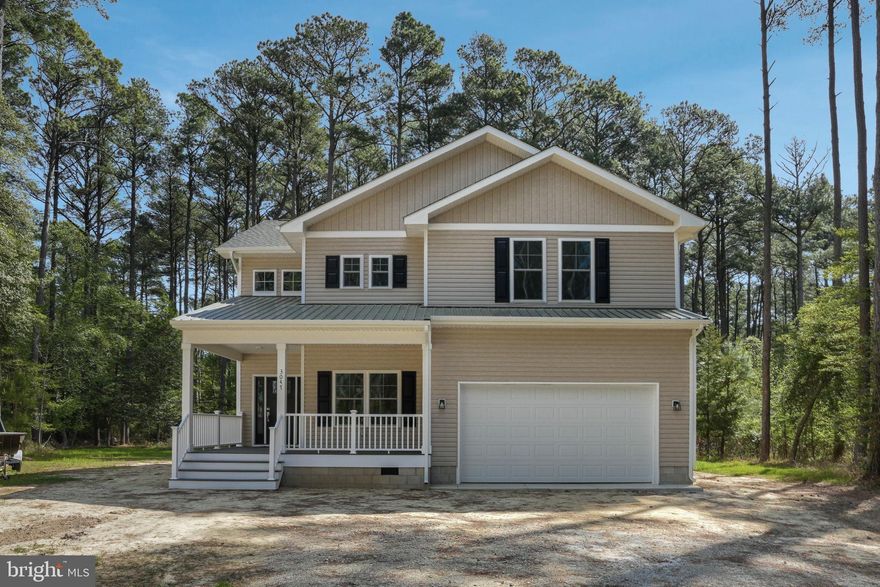 Welcome to your dream home in the prestigious Captain's Cove community! This exquisite 2-story new construction residence promises modern luxury with 4 generously sized bedrooms and 2 1/2 beautifully designed bathrooms. As you step onto the covered front porch, the inviting foyer ushers you into a home that blends elegance with functionality. The open concept layout boasts LVP flooring throughout, exuding warmth and durability. Unwind in the spacious living room adorned with a built-in electric fireplace, perfect for cozy evenings. The adjoining dining area flows seamlessly into a state-of-the-art kitchen, featuring granite countertops, an island, and stainless steel appliances, complemented by a convenient pantry closet. A dedicated office and 1/2 bath on the main floor add practicality to sophisticated living. Venture upstairs to find a sanctuary in the primary bedroom, complete with a private bath showcasing an oversized tile shower, soaking tub, and an expansive walk-in closet. Three additional bedrooms provide ample space for family or guests, sharing access to a full bath and a separate laundry room for convenience. Indulge in serene views from the screened-in porch overlooking the tranquil forest backdrop. Completing this perfect abode is an attached 2-car garage, ensuring plenty of storage and easy accessibility. This home is more than a living space—it's an opportunity to embrace an unparalleled lifestyle!