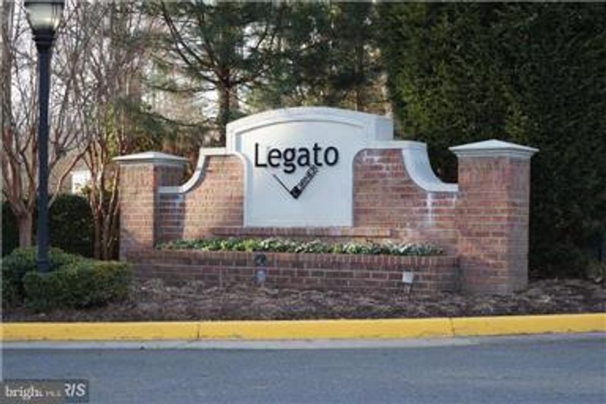 Move In Ready Condo in gated Legato Corner community. Pergo Flooring, huge balcony, built in shelving and desk area. Walk in closets, plus a "NEST" wifi thermostat. Granite counter top, Stainless Steel Appliances, W/D in unit. 1 assigned parking space. Near Fairfax Corner, Wegmans and more! Resort like pool & gym in gated community.  Water Included. Avail 8/15/2017