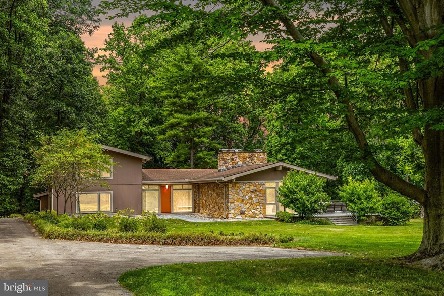 Nestled amidst the picturesque landscapes of the Main Line, this meticulously crafted residence beckons with an air of understated elegance and modern allure. Set upon 1.45 acres of lush greenery, the home offers a serene retreat with four bedrooms and four and a half baths, meticulously renovated to blend contemporary design with timeless charm.
Step inside to discover a seamless fusion of modern sensibility and natural beauty. Oversized windows flood the interiors with soft, natural light, while accents of natural stone add a touch of sophistication to the flowing floor plan. Each space invites you to linger, offering a harmonious balance of comfort and style.
The heart of the home lies in its chef's kitchen, where custom cabinetry and high-end appliances create a culinary haven for both casual meals and grand entertaining. Upstairs, the master suite awaits, boasting a luxurious ensuite bath and custom closet, providing a tranquil retreat at day's end.
As you explore further, a lower level retreat offers flexible living space and modern amenities, seamlessly blending function with comfort. Outside, a wrap-around deck and patio provide the perfect setting for al fresco dining or quiet moments of reflection, surrounded by the beauty of nature.
With its captivating design, inviting interiors, and idyllic setting, this Main Line gem offers a unique opportunity to experience the epitome of modern luxury. Welcome home to a place where every detail tells a story and every moment is infused with warmth and charm.