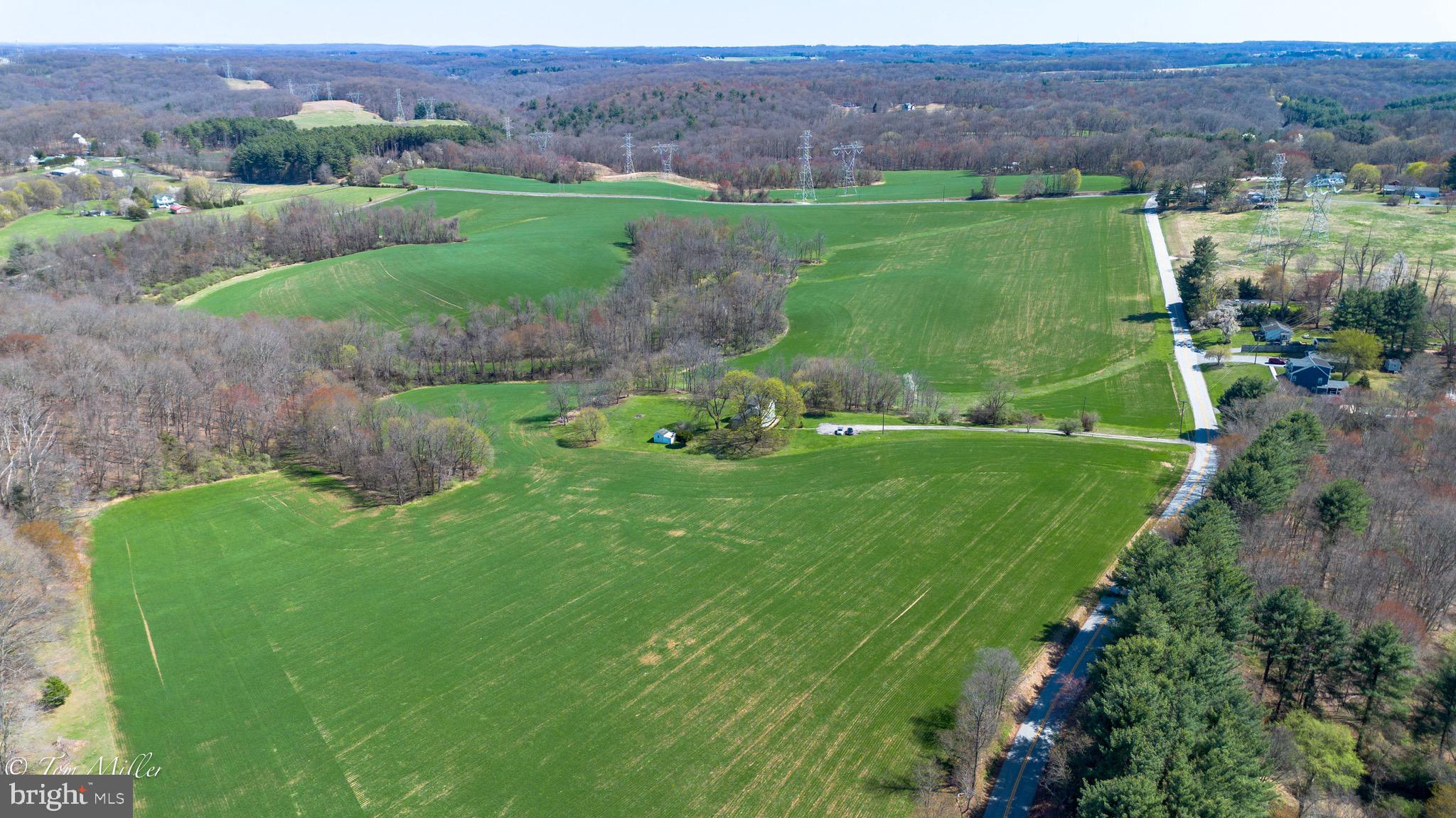 The Pictures say it All! The Setting of this Bucolic Property is very Special. Peace and Quiet on 118 Commanding Acres. One is surrounded by beautiful rolling hills, lush fields, and partial woods. The Charming farm house has been meticulously renovated and updated. Updated windows, HVAC, Kitchen, floors and paint. Take nature walks, sleep under the stars! Gunpowder River is just minutes away for fishing. Winter Wheat is currently planted and property is being leased for crops. Property goes on the other side of Green Road. Approximately 83 acres are cropland and approximately 31 are woodlands. Deed of Easement in Documents. Please call Listing Agent for more details.