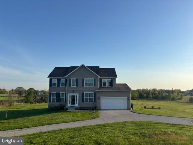 Lovingly cared for 4 BR Colonial on 5.2 acres with stunning views. The large main level complete with oversized family room, separate dining area and private office. The upper level boasts a primary suite with walk-in closet and bath with garden tub and separate shower, three more oversized bedrooms and laundry. The finished basement adds even more space for a game room and movie nights. Lots of storage. Heated pole building, screened porch, chicken coop and all the modern conveniences. Welcome home, relax and enjoy.
