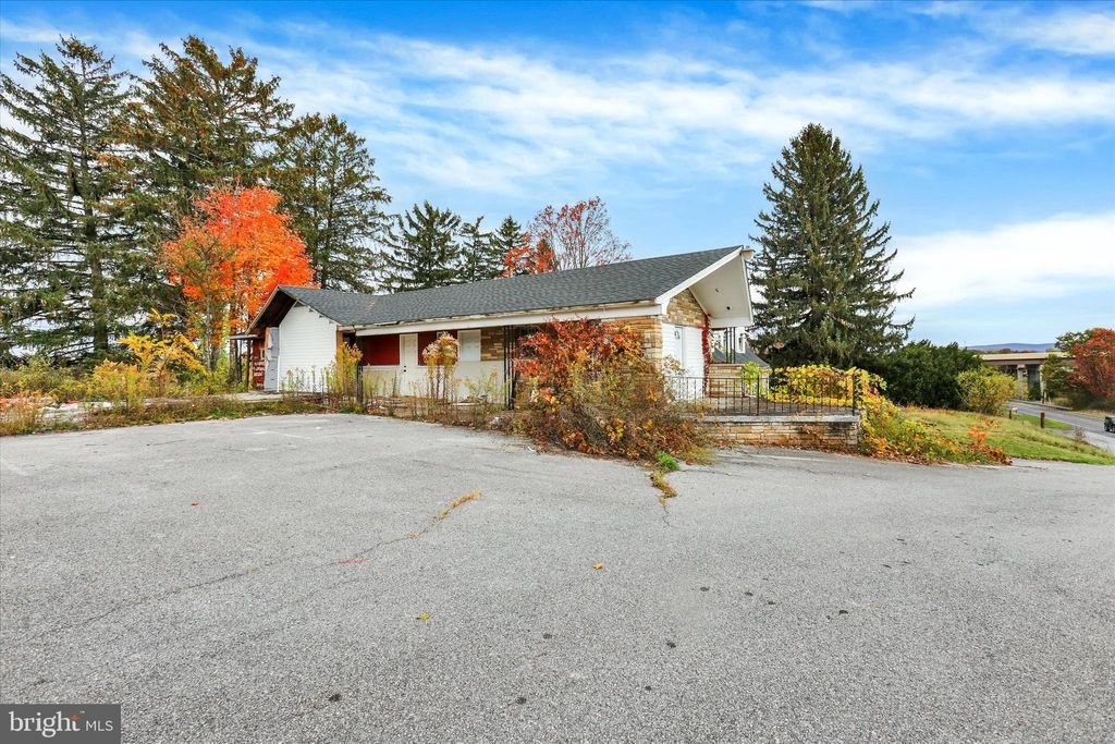 Photo of 664 Breezewood Rd S, BREEZEWOOD, PA 15533 (MLS # PABD2003014)