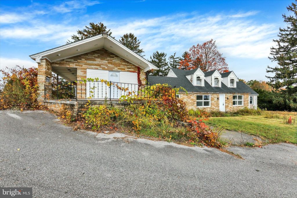 Photo of 664 Breezewood Rd S, BREEZEWOOD, PA 15533 (MLS # PABD2003014)