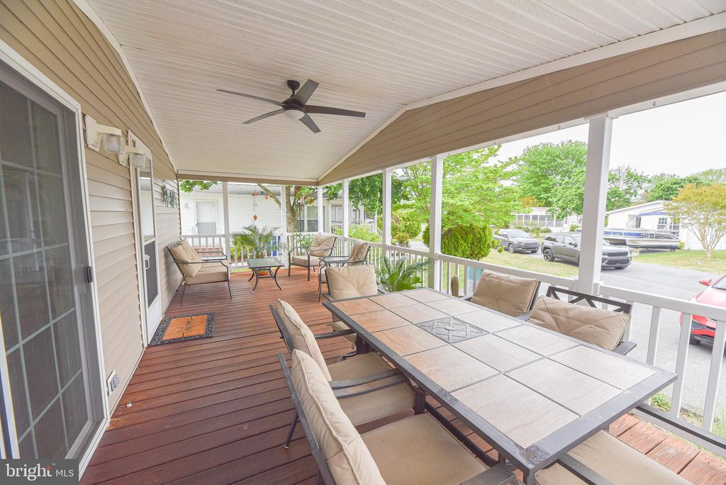 Photo of 26545 Woodchuck Lane #E-862, LONG NECK, DE 19966 (MLS # DESU2111468)