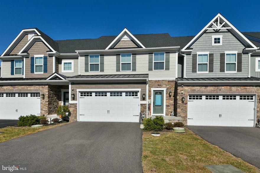 Welcome to 1029 Moscariello Lane in the highly sought-after Overlook at Creekside community, nestled within the award-winning Spring-Ford Area School District. This home offers an ideal location, with convenient access to major routes like 422, 100, Ridge Pike, and Swamp Pike, placing shopping, dining, and recreational activities right at your doorstep. As you step into the home, you're greeted by a spacious open-concept design. The entryway leads you to a gourmet kitchen, beautifully appointed with quartz countertops, a double stainless steel sink, under-cabinet lighting, bar seating, and custom cabinetry. The kitchen flows seamlessly into the main living area with upgraded bump out, a versatile space ready to accommodate your vision. Whether it's a formal dining space, cozy reading nooks by the gas fireplace, or an inviting great room, the options are endless. Step outside onto the Trex deck, which overlooks a serene tree-lined backdrop – the perfect spot for morning coffee or dining al fresco in the warmer months . One of the home's standout features is the first-floor owner's suite, which includes a well-appointed en-suite bathroom and a walk-in closet, providing the ease and comfort of single-floor living. The first floor also includes a half bath, a laundry room, and access to a two-car garage.
The second floor opens to a large loft area, ideal for a home office, game room, or movie space. Two additional bedrooms with ample closet space and a full bathroom complete this level. There's also an unfinished room that could be used for extra storage or transformed into a custom closet.
The walkout basement offers unlimited potential to create your dream space. With additional upgrades such as recessed lighting, a whole-house humidifier, and crown molding, this home truly stands out in both comfort and style. ***Showings start at the Open House on Saturday, October 26th from 11 AM- 1 PM.***