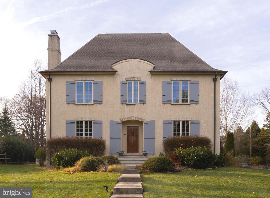 MORE PHOTOS COMING SOON. Welcome to this gracious 4 bedroom, 4 ½ bath, 4,810 square foot center hall French colonial set high on a beautifully situated .4 acre corner lot in a walk to everything location in Chestnut hill. Built in 2004, this home has a thoughtful and flowing open floor plan providing exceptional light, scale, and livability for modern living. The expansive chef’s kitchen serves as the heart of the home, featuring a large center island with prep sink, Wolf 6 burner range, abundant cabinetry, and seamless connection to the sun-filled family room with fireplace and French doors leading to the flagstone patio: perfect for indoor/outdoor entertaining. A spacious living room with fireplace, dining room and pantry connect to the kitchen, while a practical mudroom opens to the back courtyard, driveway and detached two car garage. A rare feature in this community, the FIRST FLOOR PRIMARY SUITE could offer true one level living; currently used as a LARGE OFFICE with built in cabinetry, this suite could include a separate dressing room (currently used as a guest bedroom), full bath, and a laundry room. A powder room completes the first floor.

Upstairs, the second level includes three generously sized bedrooms, each with its own en-suite bathroom; one of the bedrooms is currently used as the primary suite complete with walk in closet. All the bedrooms have excellent closet space suited to modern needs. The basement is partially finished for extra space for living, entertaining and exercising.  

Charming exterior details include classic shutters, copper gutters and downspouts and mature landscaping, enhancing the home's curb appeal and presence.

8204 Crittenden Street delivers the perfect balance of convenience, comfort, and timeless style in one of Philadelphia’s most desirable neighborhoods, just steps from the train line and the boutiques and restaurants along Germantown Avenue. Do not miss this special home.