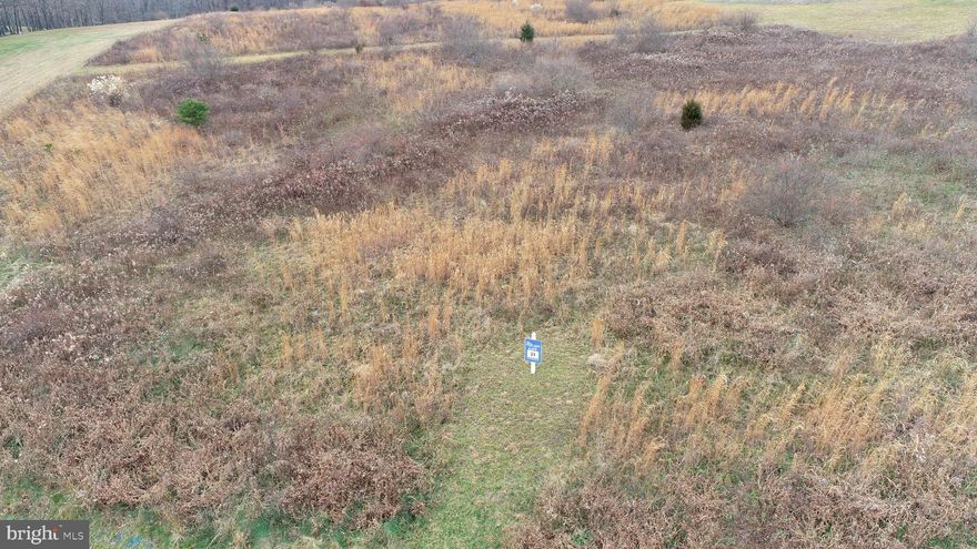 THIS LOT HAS 1.89 ACRES.  8 BUILDING LOTS AVAILABLE EXCLUSIVE BUILDER IS FINE LINE HOMES.  ALL LOTS HAVE BEEN PERKED AND PROBED FOR SEPTIC SYSTEMS, NONE INSTALLED.  WELLS WILL NEED TO BE DRILLED BY THE BUYER.  PRICING FROM $65,000 TO $99,900 SIZE FROM 1.89 ACRES TO 3.46 ACRES