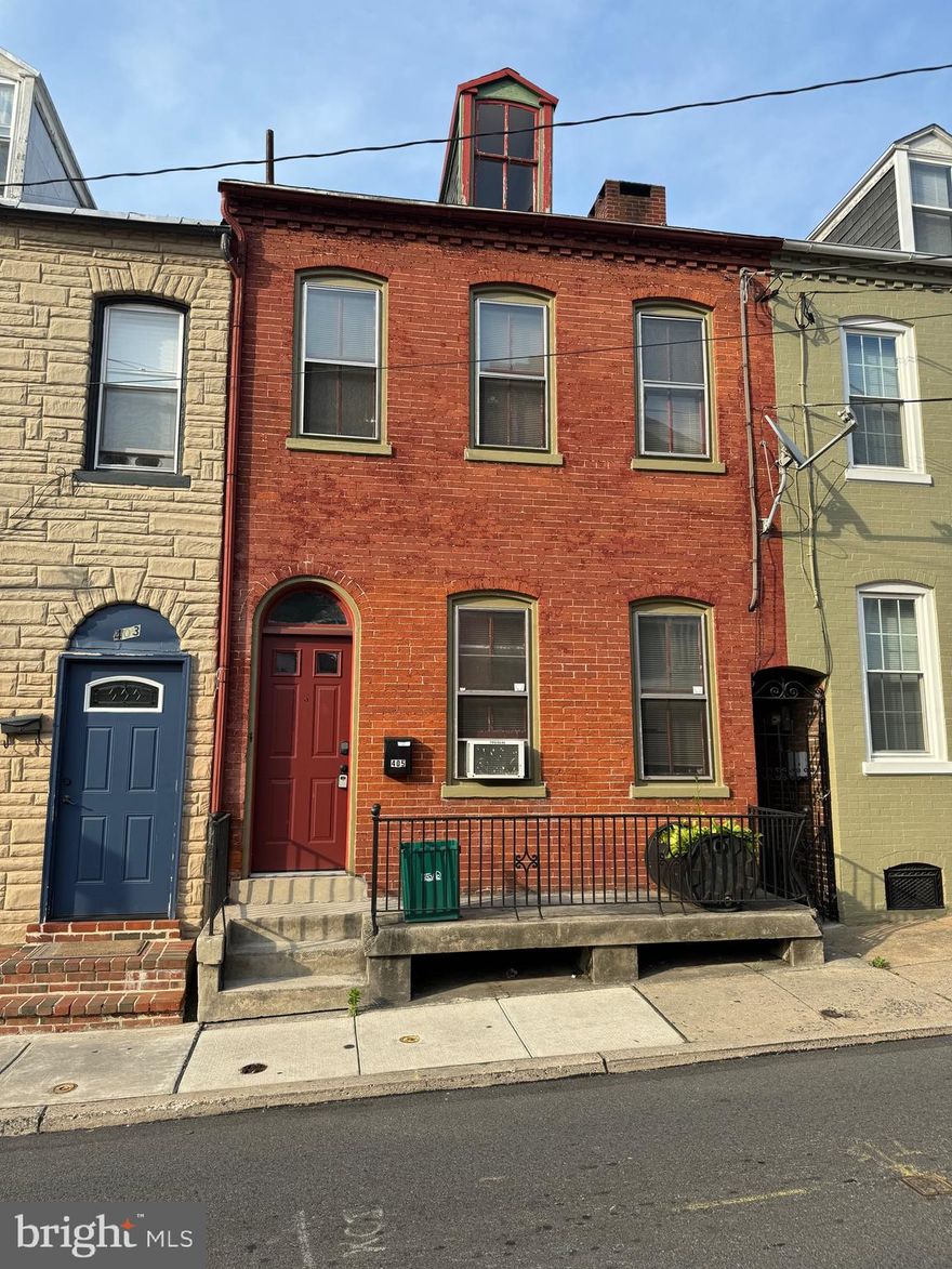 Discover the perfect blend of historic charm and urban convenience with this brick townhome in Lancaster, situated within walking distance of downtown! Boasting 3 to 4 bedrooms, 1.5 bathrooms, and over 1,300 sq. ft. of potential-packed living space, this property presents an incredible opportunity for both investors and owner-occupants alike. While this home requires some TLC, it offers immense upside potential for those willing to roll up their sleeves and bring their vision to life. With recent servicing and re-shingling of the roof, an updated electrical panel, and a reliable mini-split system, the groundwork has been laid for a transformational renovation project. Rarely does a Lancaster home with this much equity potential become available – don't miss your chance to seize this opportunity! Schedule a showing today and envision the possibilities of making this your new urban oasis in the heart of Lancaster. This opportunity won't stay on the market for long!