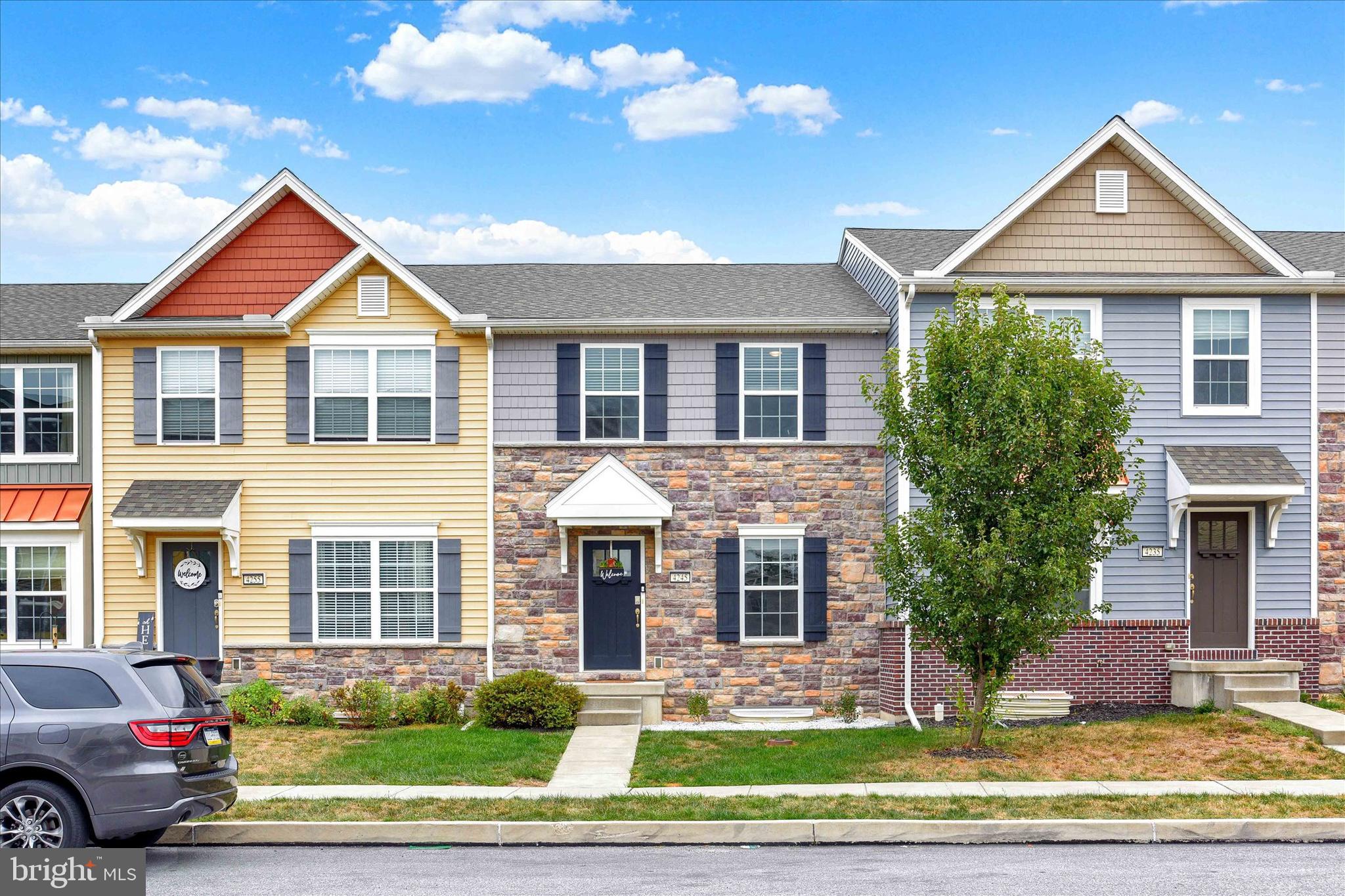 Welcome home to this turn-key townhome in the heart of Hampden Township! Situated within Cumberland Valley School District in the desirable Laurel Ridge Estates neighborhood, this property is sure to impress. Step inside to find beautiful luxury vinyl plank flooring and an inviting open-concept floor plan. The kitchen features granite countertops, an island for meal prep with seating, and stainless steel appliances—including a brand-new Bosch dishwasher. The adjacent dining area makes mealtimes easy, while sliding doors lead to a spacious deck, perfect for grilling or entertaining outdoors. A convenient half bath completes the main level. Upstairs you’ll find three generously sized bedrooms, including a spacious primary suite with a walk-in closet and a convenient ensuite bathroom. The current owners have upgraded the hallway and bedrooms with beautiful luxury vinyl plank flooring, adding both style and durability. A full hall bath and a laundry area complete the second level. Need more room? Head down to the basement for additional living space, making the perfect office, playroom, home gym or additional family room. The lovely luxury vinyl plank continues through to this level as well. New water heater was just added this year! Located close to parks, shopping, restaurants, hospitals, and main highways, this home is a joy to own!