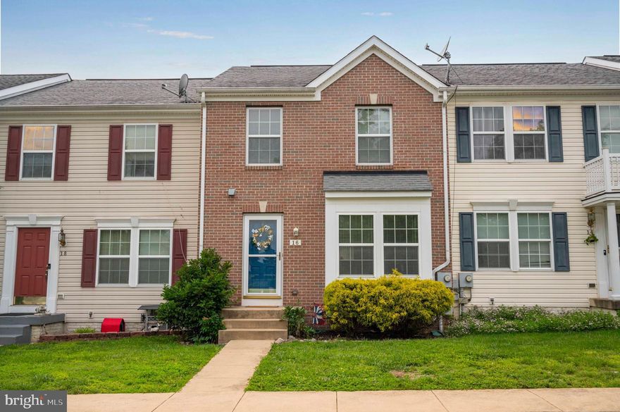 This three bedroom, brick front townhouse has been well-kept by its single-owner and holds an exceptional location adjoining the The Sycamore and Van Metre 9 at Stonebridge.  Beautiful inside and out, the home has manicured landscaping, privacy fencing in the rear yard, plus a deck and patio for additional outdoor living space.  The interior features a small bump out in the main level living area for added daylighting, beautiful hardwood flooring, a powder room for convenience, and newly updated appliances in the kitchen.  The upper level has a large owner's suite and two guest bedrooms that share a second full bathroom, while the finished lower level has easy access to the rear patio and includes another flexible entertainment space plus a third full bathroom.  Move-in ready and packed full of upgrades - this home is a standout - come see for yourself!