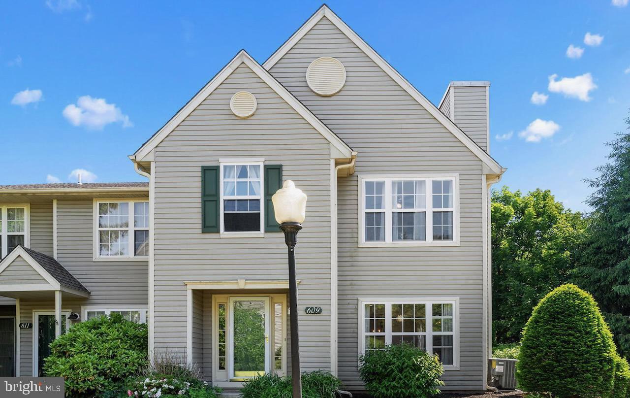 Step into this stunningly updated end-unit townhome—truly a home you won’t want to miss! Featuring 3 spacious bedrooms and 2.5 bathrooms, the layout welcomes you with an airy, open-concept design that connects the living room, dining area, and kitchen in a seamless flow. Sunlight pours through the many windows, complemented by recessed lighting and stylish new vinyl plank flooring throughout the main level. The cozy living room offers a wood-burning fireplace—perfect for quiet evenings. The kitchen showcases modern gray wood cabinetry, generous counter space, a sleek tile backsplash, and granite countertops. The adjacent dining area easily fits a large table, making it perfect for hosting. Glass sliders lead to a private patio, creating an effortless indoor-outdoor living experience. A convenient laundry and storage room sits just off the kitchen, along with a well-placed half bath. Upstairs, the primary suite features a walk-in closet and a private full bathroom. Two additional bedrooms offer plenty of closet space and share a second full bath. For added convenience, there’s an outdoor storage closet accessible from the patio. All appliances are just a couple years old. Enjoy the ease of low-maintenance living and everything this beautifully refreshed home has to offer!