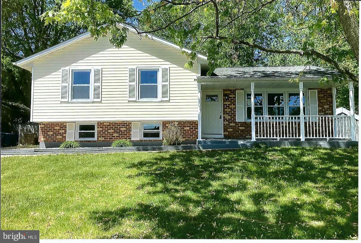 ELKTON-Buckhill Farms-Quite neighborhood , close to shopping and 1 mile from Delaware Line. This 4-5 bedroom split-level offers 3 levels of comfort. Town public water and sewer with trash pick-up. Upgrades include new roof with Architectural shingles. New vinyl windows, new exterior and interior doors. New bathroom , Kitchen has Troy Granite-counter top with nice new gray cabinets and new appliances. Upper level 3 bedroom, one large bath, hardwood floors Large closets in every bedroom. Main level large living room. New air conditioning & heat pump unit. This unit gives heating and a/c to the upper level floors. Country eat-in kitchen with views to fenced back yard. Lower level 2 bedrooms with a lot of natural light. Several windows in each room. Freshly painted with new matching plank vinyl flooring. Utility room has washer & dryer hookups, new 50 gallon hot water heater and new sump pump. New concrete driveway with additional on street parking. TO SCHEDULE A SHOWING PLEASE CALL THE SHOWING CONTACT NUMBER LISTED IN THE LISTING.