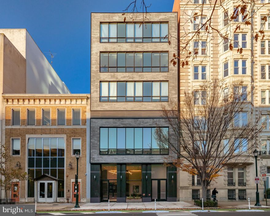 Designed for the resident who values discretion, simplicity & high-end living, this full-floor new construction condominium spans over 3100 sf  and features 3 bedrooms, 3.5 bathrooms, 3 sides of large windows, a private terrace, attached garage parking, and a separate storage room. The elevator door opens to a private vestibule exclusively for Unit 4. Once inside the residence, you will notice the high ceilings and natural light from the south and west-facing windows that line the entry hall & living room. The living room is expansive with room for both a dining room and living room or one large entertaining space. The oversized windows are outfitted with motorized shades and provide a lovely view over the neighboring buildings. The kitchen is a cook's dream with custom cabinetry, a grand island, quartz countertops, and a suite of high-end appliances which include the vented Wolf stove with 6 burners plus a griddle and 2 ovens, 48'' Sub-Zero Refrigerator, built-in coffee/espresso cafe, and a 36'' beverage/wine chiller. This eat-in space is ideal for both cooking and welcoming guests and is adjacent to a powder room and a private terrace with plenty of room for outdoor dining and lounging. The primary bedroom suite is complete with a customized walk-in closet and a lavish en-suite bathroom which features a double vanity sink with stone counters, an expansive seamless glass shower, soaking tub, and a separate water closet. Two additional spacious bedrooms are just down the hall and each includes an en-suite bathroom. This unit is complete with a laundry room and additional storage closets throughout. 2207 Chestnut is a premiere location with close proximity to the Schuylkill River Train for running, walking, and biking, Traders Joes, Whole Foods, 30th Street Station, Penn, CHOP, Drexel, Fitler Club, and some of the best restaurants and retail the city has to offer. LOW MONTHLY FEES AND  TAX ABATEMENT.