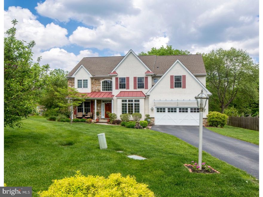 With its beautiful architectural details, graceful sloping rooflines, charming window shutters and an enticing stone & stucco fa?ade, 613 Argyle exudes unique warmth and curb appeal. This impeccable Estate Manor home, handcrafted by the experts at Vintage Development, has an inviting presence in a desirable setting on a quiet cul-de-sac street. The expansive interior has been magnificently done, boasting substantial upgrades and refined finishes throughout. A soaring reception hall graced by gorgeous wood floors and huge wide openings to the main rooms is a breathtaking entry experience. The entire light-bathed first floor welcomes entertaining, with a seamless flow between the gracious living room and elegant wainscoted dining room with butler's pantry to accommodate formal gatherings. Both the cook and family will appreciate the effortless connection between the supremely-designed gourmet kitchen and adjacent open family room with coffered ceilings and gas fireplace. Serve a spread of hors d'oeuvres on the kitchen's large center island with seating while guests gather and mingle. Top-quality Century wood cabinetry, granite countertops, stainless steel appliances and a workstation area make this hub of the home both admired and very functional. An open breakfast room is a lovely spot for casual dining and morning java, brightened by glass-paneled French doors leading out to the spacious rear deck that overlooks scenic grounds. The main-floor study with a vaulted ceiling, built-in desk & cabinetry, and wall of windows showcasing gorgeous lawn & greenery is a peaceful setting for reading, working, or simply gazing out at nature. The main stairs ascend to an open upper landing, which proceeds to the generously-sized bedrooms. The master suite enjoys brilliant sunshine as well as a finely-appointed private bath. Three additional bedrooms with ample closets, 2 full baths, and a windowed laundry room with a sink and cabinetry also occupy the 2nd level. A haven for family & everyone's friends, the nicely-finished lower level presents a huge recreation room with a handsome wood bar, media/sitting area, extra bedroom & full bath. Central air conditioning & a built-in 2-car garage are among the other highlights contributing to your comfort.