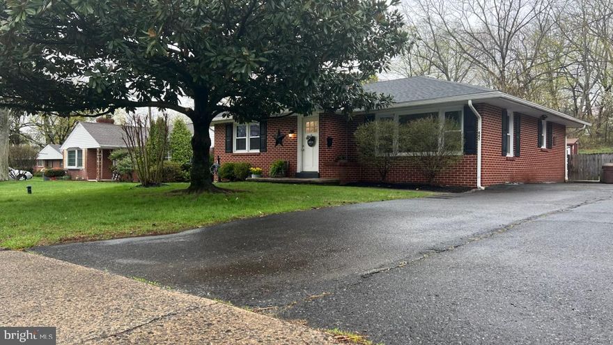 Don't miss out on this Charming, Brick Ranch nestled in Souderton Borough.  Conveniently located only a few blocks from local dining, breweries, entertainment and shopping!  On your approach you are welcomed by a glorious Magnolia tree.   Lovingly transported by "Aunt Pat" from Houston, TX nearly 50 years ago, this beauty produces show stopping blooms every year!  As you enter the home, you feel the warmth and care instilled within.  Newer windows, roof, electric and HVAC provide sound mechanical reliability.  Each bedroom offers gorgeous hardwood floors.  Find glistening tile in the hall bathroom.  The kitchen provides  Stainless Steel appliances,  ample storage and work space.  The basement is clean and inviting.  Perfect as a rec room, office, or craft/work space and/or storage area.  Out the back door, you enter a  spacious, 18x14, covered, screened patio, perfect for your cookouts, cocktail hour or zen moments overlooking the fenced rear yard.  If you wait, you will miss a great home for starters, finishers and everyone in between.