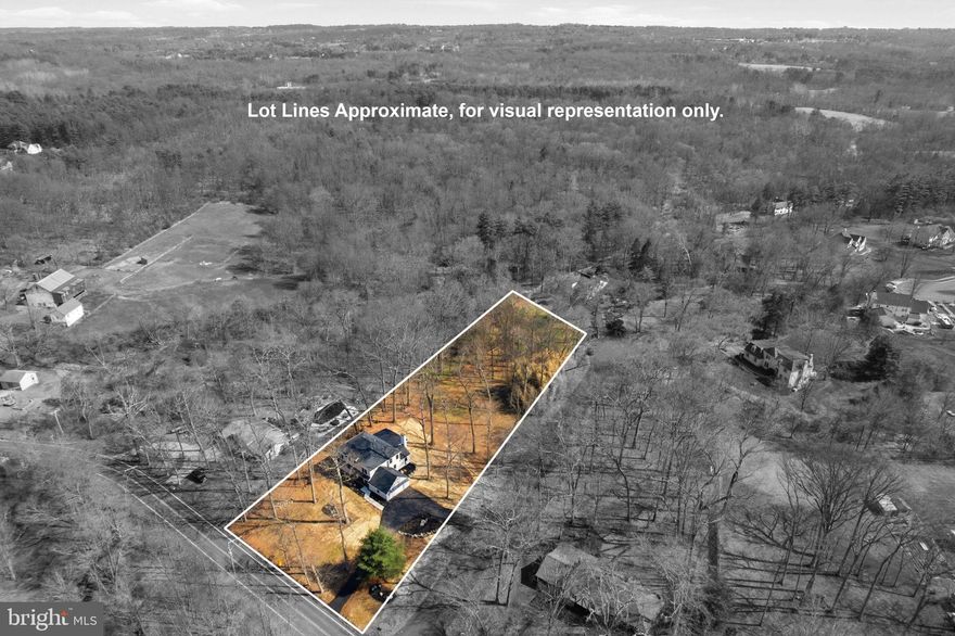 Move-In Ready Luxury with the Feel of New Construction—Without the Wait! Privately tucked at the end of a quiet cul-de-sac-style lane in the Hidden Forest setting of Skippack Township, this home sits on a rare 1.68-acre flat, park-like lot—offering an extraordinary blend of privacy, space, and refined living.

UPGRADES & ADDITIONS: Extensively upgraded, expanded, and reimagined for modern living, this home showcases exceptional craftsmanship and thoughtful design throughout. Major improvements include a second-floor addition, a fully rebuilt and redesigned main level, and a finished walk-out basement offering added versatility and living space. The home features all-new systems, including dual high-efficiency Carrier HVAC units, new double-hung windows, single-panel interior doors, a new roof, custom trim work, premium JAMES HARDIE, and SOLID HARDWOOD flooring throughout for lasting durability and elevated style. Enjoy the newly built front and back porches, complete with Metal roofs, tongue-and-groove ceilings, and recessed lighting. Additional upgrades include all-new electrical and plumbing brought up to current code, West Elm vanities, and custom carpentry throughout.

INTERIOR . A grand double-door foyer opens to thoughtfully designed living areas, including both a formal living room and a spacious family room featuring custom RH-inspired built-ins and a wood-burning fireplace. The main level has been carefully designed to offer the best of OPEN-CONCEPT living while still creating a sense of separation and privacy. Smartly integrated storage solutions—including a custom walk-in closet—provide flexible space to keep everyday living organized.

The GOURMET kitchen is a true showpiece, centered around a dramatic waterfall-edge quartz island and outfitted with premium cabinetry, pantry storage, stainless steel appliances, and a 6-burner GAS range.  A seamless quartz backsplash and custom hood create a timeless, high-end look, while the commercial-grade exterior-vented exhaust delivers top-tier performance. Built-in microwave and wine/baverage cooler, garage disposal. 

The MAIN level also features a private BEDROOM suite complete with a full bathroom and walk-in closet—ideal for office, guests, extended family, or multigenerational living—along with an ADDITIONAL well-appointed powder room for everyday convenience. A dedicated LAUNDRY room enhances functionality with built-in shelving, cabinetry, and a utility sink.

UPSTAIRS:  primary suite—enhanced by the addition—offers a true retreat with soaring cathedral ceilings, a sunlit sitting area, peaceful wooded views, and a spa-inspired bath featuring slate flooring, a quartz double vanity, and a luxurious multi-head walk-in shower. Three additional bedrooms showcase solid hardwood flooring, recessed lighting, ceiling fans, and generously sized custom built-in closets. A beautifully appointed hall bath impresses with a double vanity, designer tilework, and elegant architectural arches. The second level is further elevated by a stunning hallway, custom-designed IRON RAILING and balusters, and a grand two-story foyer staircase that adds timeless sophistication. Thoughtfully designed for comfort and efficiency, this floor includes its own HVAC system installed in the attic, convenient hallway attic access, and large windows in every room that fill the home with natural light while capturing serene views.

The partially finished BASEMENT adds valuable flexibility, with both interior access and walk-out exterior steps. Ideal for a playroom, home gym, media room, or mancave, the space also includes built-in shelving for practical storage.

Ideally located just minutes from Skippack Village, this home offers easy access to boutique shopping, dining, and year-round community events. With convenient access to the Pennsylvania Turnpike, commuting to King of Prussia, Philadelphia, and beyond is effortless—all within the highly desirable Perkiomen Valley School District.