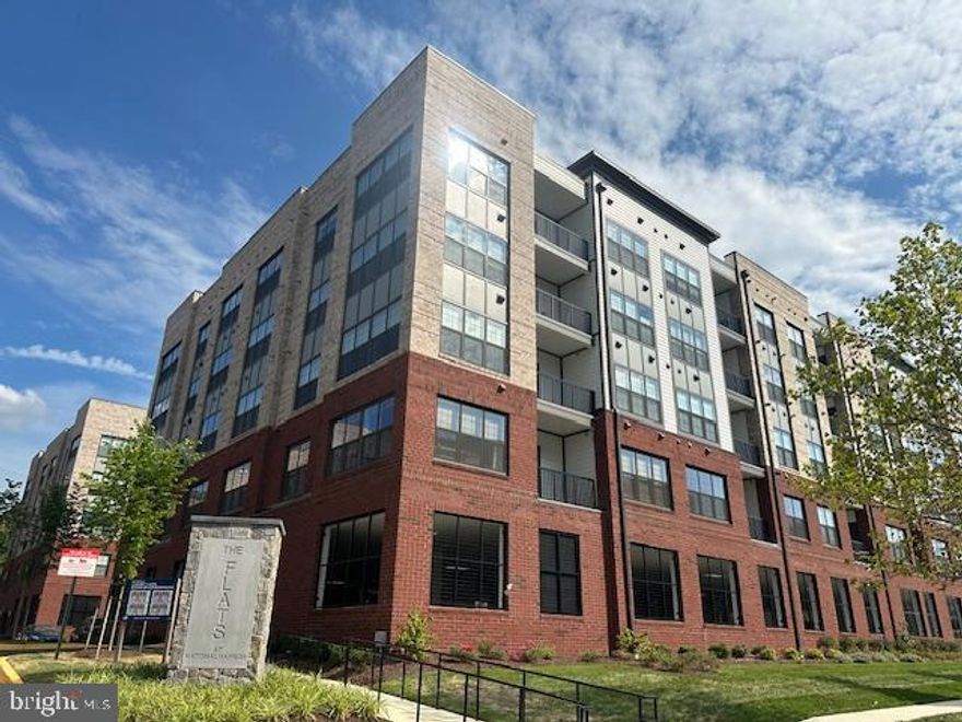 Welcome to your new home at the Flats at National Harbor. This exquisite Chase model first-floor condo offers the perfect blend of luxury, convenience, and style. As you step inside, you'll be captivated by the open and airy layout, beautifully complemented by a modern white kitchen that exudes sophistication.
The kitchen is a chef's dream, featuring pristine white cabinetry, and state-of-the-art stainless steel appliances. Whether you're preparing a gourmet meal or a quick snack, this kitchen provides the perfect backdrop with its clean lines and contemporary design.
Enjoy the ease of in-unit laundry with a full-size washer and dryer, making everyday chores a breeze. The spacious living area flows seamlessly from the kitchen, offering ample space for relaxation and entertaining. Parking is never a hassle with your dedicated spot in the secure garage. 
Located in the sought-after National Harbor, you'll have the best of dining, shopping,  entertainment right at your doorstep.
This condo is more than just a place to live; it's a lifestyle. Experience the perfect blend of luxury and convenience in a location that offers everything you could desire. Don't miss out on this opportunity to make this stunning condo your new home! Pets case by case. No Smoking.