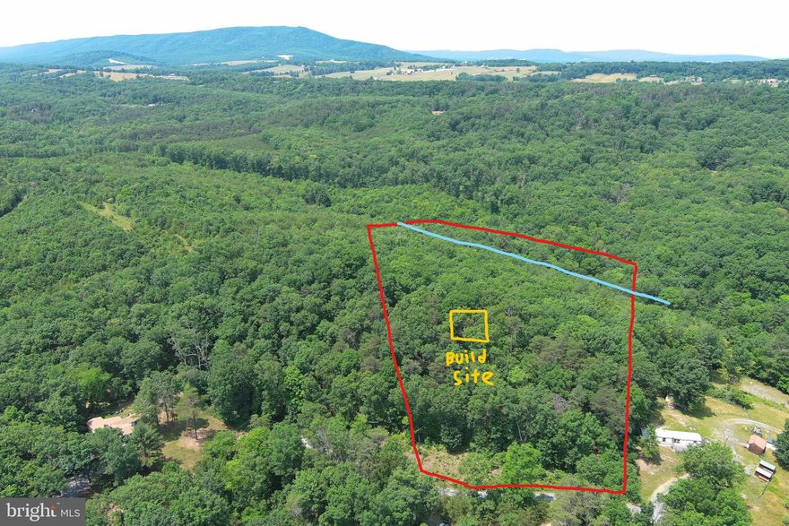 UNRESTRICTED......EXCEPT THAT IT CAN'T BE SUBDIVIDED......OTHER THAN THAT.....ANYTHING GOES! NO FORMAL HOA.....ONLY A ROAD COMMITTEE.....$200 ANNUAL ROAD MAINTENANCE FEE. NEARLY 8 ACRES COVERED IN MASSIVE HARDWOODS WITH BIG FLAT RIDGE TOP BUILDING SITE, OFFERING MOUNTAIN VIEWS TO THE EAST......BIG WIDE HOLLOW WITH SMALL WET WEATHER STREAM. THIS PROPERTY IS A JACK OF ALL TRADES, USE IT FOR RECREATION; CAMP, HUNT, SHOOT, ATV'S OR BUILD A BIG HOUSE OR A TINY HOME.....BUILD WHATEVER YOU WANT! THIS PROPERTY IS SO GOOD, THE CURRENT OWNER HAS KEPT IT FOR 50 YEARS! HE'S MADE A LOT OF GOOD MEMORIES AND TAKEN A LOT OF DEER OFF THIS LAND BUT HE CAN'T TAKE IT WITH HIM......LESS THAN A 1/2 MILE OFF THE PAVED ROAD, 2 MILES OFF RT 50, 30 MINUTES FROM WINCHESTER, VA AND ONLY 115 MILES FROM THE WHITE HOUSE.....CONVENIENT LOCATION WITH A PRIVATE BUILDING SITE AND ROOM TO ROAM. THE NEXT 50 YEARS HERE COULD BE YOURS.....IT'S TIME TO HEAD WEST YOUNG MAN!