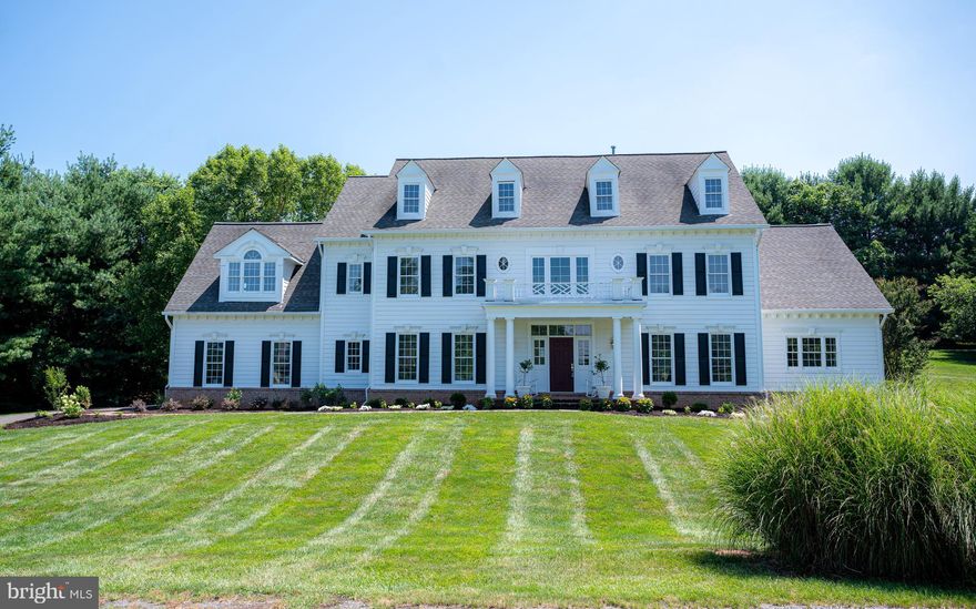 It is my honor to introduce this Gorgeous, one of a kind multi-generational Colonial, nestled on 1.72 acres. 333 Sinegar Place is part of the Fantastic Estates at Lowes Island! As you approach the home you will be captivated by the timeless beauty of the home’s exterior. This home has been restored to its original glory from a newly painted exterior, brand new landscaping surrounding the home, and completely revamped inside from top to bottom. As you enter the home, you will be greeted by an open and sunlit foyer that includes a gorgeous wooden spiral staircase.  On the first floor there is conveniently a first floor main suite with its own washer and dryer and large office . The interior of the entire house is freshly painted and the hardwood floors have been restored. The wall to wall carpet was replaced approximately one year ago. This newly renovated kitchen is equipped with an Oversized Kitchen Island, gourmet finishes and top of the line appliances. As you tour the, home you will notice all the craftsmanship and detail dedicated to each and every room. The open grassy yard behind the hardscape patio is perfect for a future pool! aA large waterfall flows into a small pond at the edge of the large stone patio.. The options are endless at this timeless beauty situated in Great Falls, Virginia. The Estates at Lowes Island, part of the fantastic Cascade Community has numerous amenities that include miles of trails with access to the Regional Park at Seneca as well as five swimming pools, three tennis courts, and two gym facilities. A major bonus of this community is Golf Cart access to the Country Club.