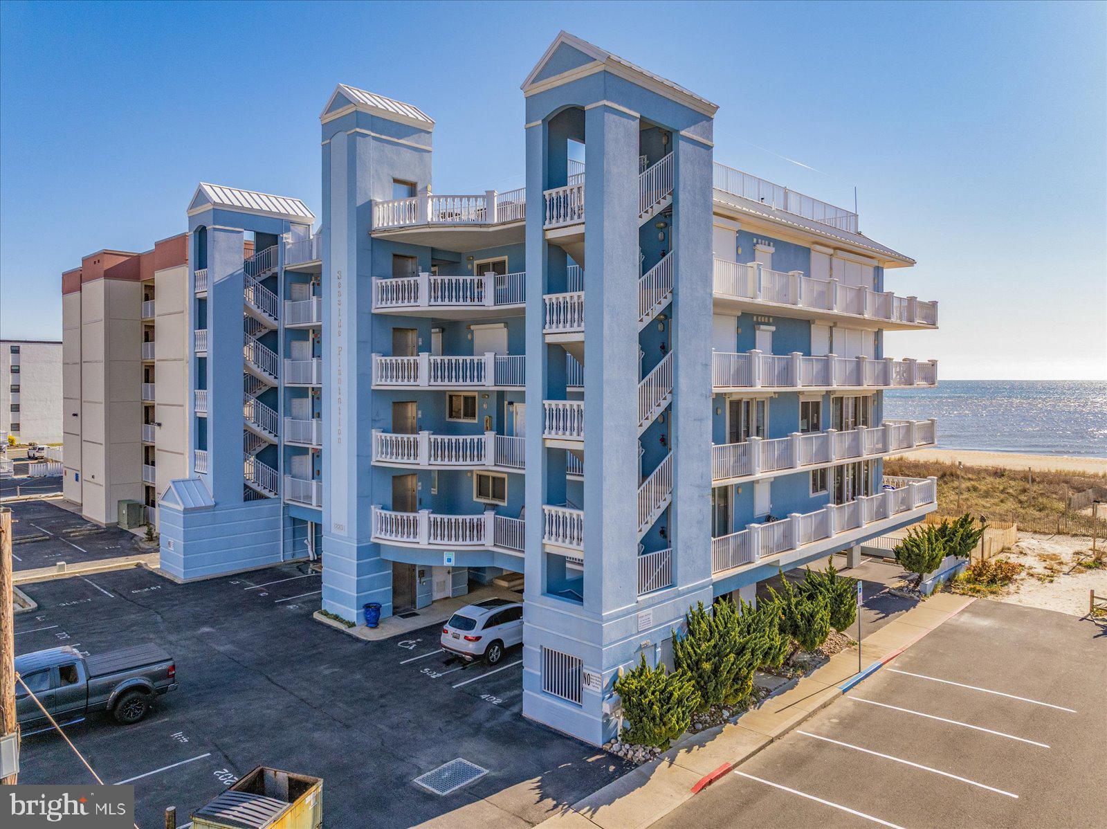 Discover the epitome of luxury in this one-of-a-kind, DIRECT OCEANFRONT condo in North Ocean City. Spanning the entire third floor of the prestigious Seaside Plantation Building, this masterpiece was custom-designed during construction to offer the finest in coastal living.
With over 4,000 square feet of interior space, this residence features 5 bedrooms, each with its own private ensuite bathroom, plus an additional half bath and a spacious study/office. The chef’s kitchen is equipped with two refrigerators, two sinks, and two dishwashers, making entertaining effortless.
Designed for both comfort and convenience, this home boasts an open-concept layout, five assigned parking spaces (including two covered), and access to a rooftop pool with an expansive sun deck. The private oceanfront balcony stretches an incredible 85 feet, while the north and south balconies each extend 58 feet, offering breathtaking, panoramic coastal views (over 1,200 sqft of balcony space)
This is a rare and unparalleled opportunity to own a truly exceptional oceanfront residence.