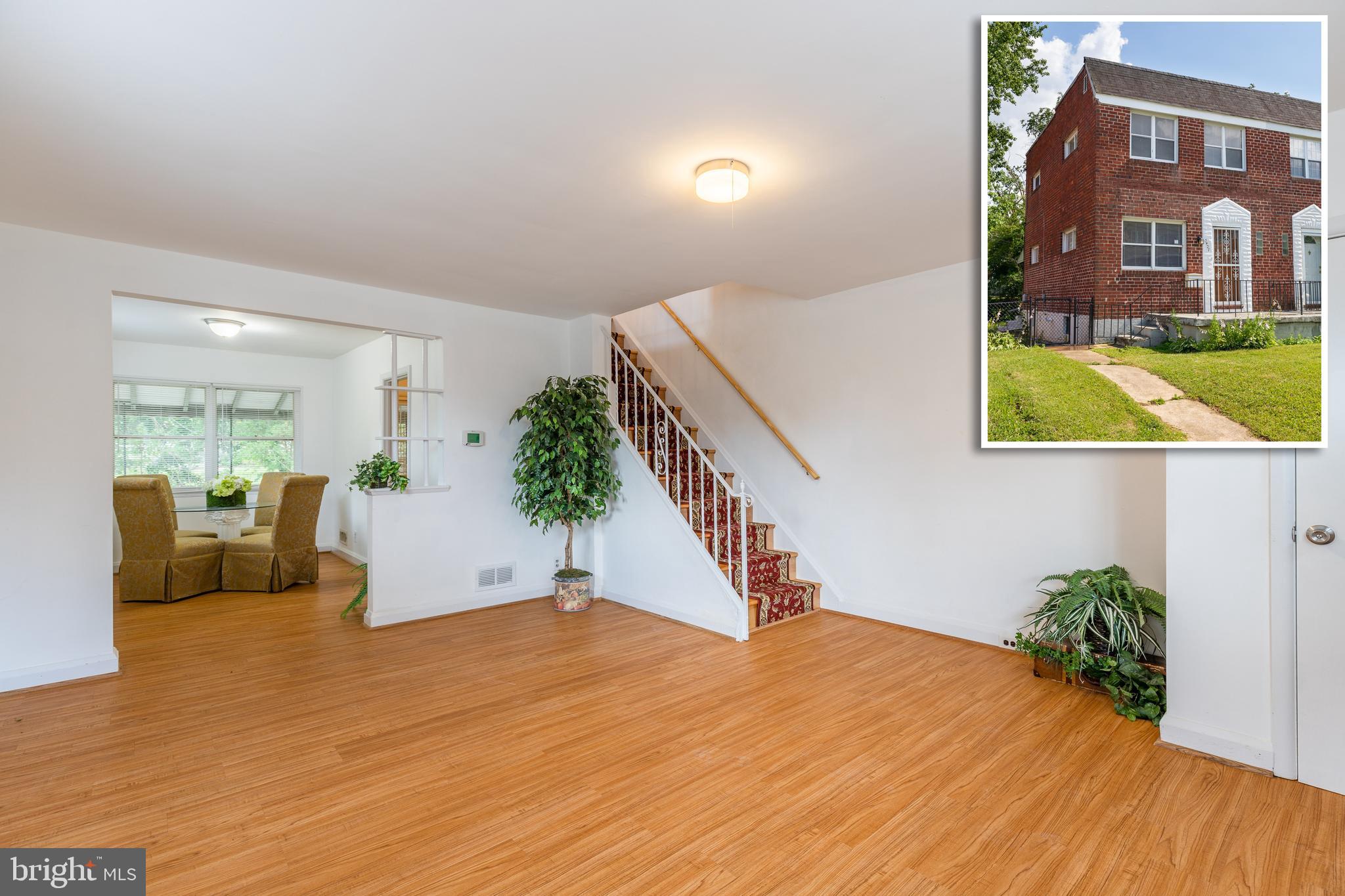 MOVE IN READY SEMI-DETACHED ROWHOME WITH 3 FINISHED LEVELS AND LARGE FENCED YARD! Spacious living room and separate dining room w/ hardwood floors, updated kitchen w/ granite counters, upper level with 3 large bedrooms and 1 full bath, finished basement with a family room or possible 4th bedroom, large laundry room, and a half bath, and a rear covered porch overlooking the large fenced yard! Pack your bags and move right in!