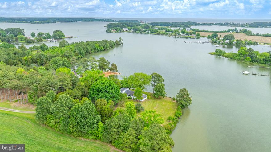 If you're looking for a private waterfront property surrounded by a protected creek, look no further. This 1-acre property on St. Jeromes Creek has approximately 385 feet of water frontage.  MLW is approximately 4 ft at the end of the pier, with an 8,000 lb boat lift and a nice area to sit on to watch the sky light up in the evenings with the sunset and stars.  There is a marina across the creek that sells gas.  You can fish in the Chesapeake Bay within minutes of the pier. There is an oversized garage for your toys and workshop.  The property has a gorgeous rare Wye Oak Tree featured in the newspaper several years ago.  
The home is very nice but needs some TLC, which is reflected in the asking price. The current condition is livable but probably not up to today's standards, depending on your thoughts.   There are a couple of very nice restaurants close to this location.  PAX River Naval Air Station and Point Lookout State Park are within 20 minutes.