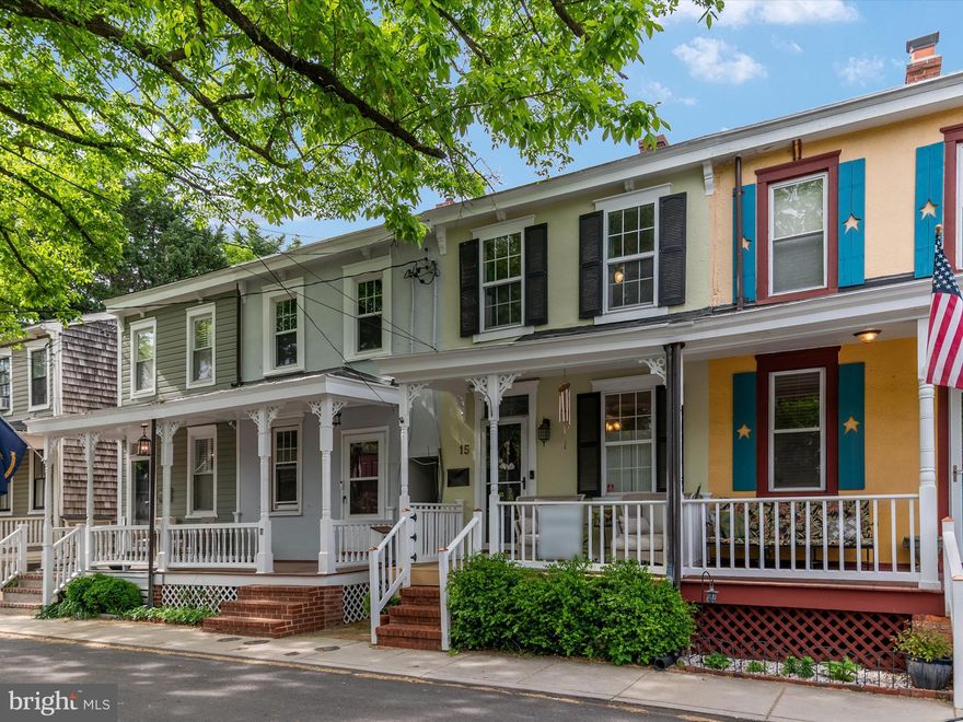 DTA, BABY!  This cool rowhome is in the prestigious Murray Hill section of Downtown Annapolis  You can WALK almost anywhere you want to go in 2-20 minutes: Navy Stadium-20, USNA-17, Tsunami-5, Curate-2...the list goes on and on.  Check out the photos for more examples of what a short walk this home is to everything.  This iconic row home may be over a 100 years old, but the kitchen is less than 3 years old and it...is...GORGEOUS!  Italian tile floors, custom cabinetry, gleaming quartize counters, recessed lighting & gas cooking!  So stylish!  This whole home is cool and cute and funky all wrapped up on one.  The living room and dining room are open but separated by a 2 sided gas fireplace(replaced in 2020) and have a great flow with gleaming hardwoods througout.  There is a cute powder room for guests.  Upstairs are two really nicely sized bedrooms on opposite sides of the level for privacy.  There is a large full bath in between with a gorgeous custom shower and full-sizd soaking tub.  The rear bedroom also has a private powder room.   And then you have the STELLAR backyard, which includes a HUGE shed for plenty of storage, a large patio for dining al fresco, a great grassy yard and fruit trees!!  This is quintescentail in-town living!   On street parking on Morris Street.  These Sellers have loved and improved this home as follows: backyard patio (2017), 50year Roof (2019),Ventless gas fireplace (2020),
Carrier A/C (2020), Washer & Dryer (2021), Hardwoods in back bedroom (2022), Kitchen (2022), Anderson Windows (2025), New soffits, decking, trim (2025)