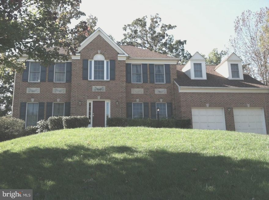 Impressive 4 BR+Den brick home with 3 spacious levels, large backyard in convenient Cascades; 4 community pools, recreation facility, trails, tennis, tot lots; L/L Suite w/Breakfast Bar, & Full Bath; Tons of storage! Main level hardwoods, library, 2-level family room, breakfast nook, formal living & dining rooms. New light grey interior! 24 month lease. No Pets. No Smoking. Lawn Service.