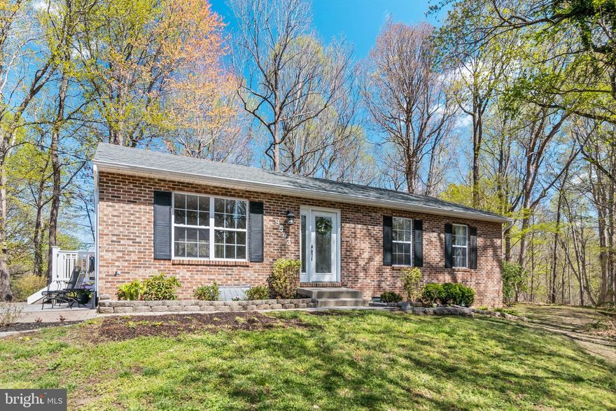 This 5-bedroom, 3-bathroom brick-front home nestled in the northern Calvert location of Owings, will check all of your boxes. There is no shortage of space, both inside and out, with two paver patios and a deck, making this home perfect for entertaining guests or relaxing after a long day. As you walk into gorgeous glass front door, you’re greeted by newly updated, tan, luxury vinyl plank flooring and a plethora of natural light flooding the space. Leading right into the kitchen that features stunning granite countertops and sleek stainless steel appliances. The rest of the main floor hosts the primary suite and two other spacious bedrooms, along with 2 beautifully updated bathrooms. Heading downstairs to the fully finished basement, you'll find two more large living areas. One side of the basement even features a wet bar & cabinets for entertaining. The final two bedrooms and another bathroom complete the space. The basement also offers a separate, walkout basement to access the backyard with a paver patio. Other amenities on the property include a spacious shed (sold as is), and a large driveway with 4 parking spaces! Make N Side Drive your new home!