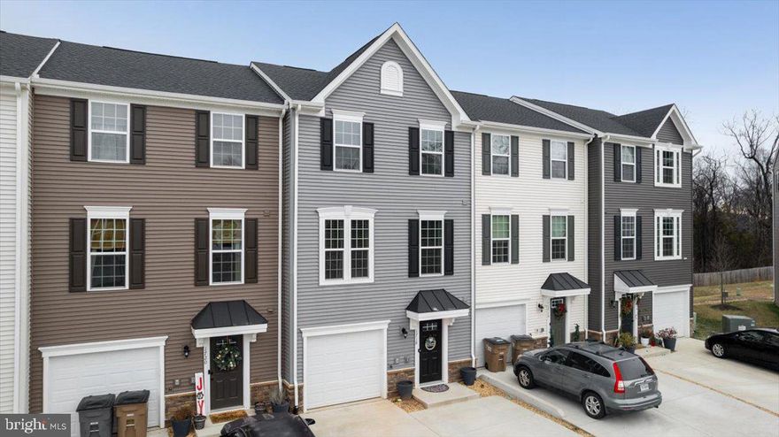 Upgrades! Upgrades! Upgrades! This beautifully designed three-level condo / townhome offers three bedrooms, two full baths, two half baths, and a one-car garage in a convenient Culpeper location. Built recently in 2023 and thoughtfully maintained, the home sits just off Route 29, providing easy access for commuting while remaining close to the heart of down-town with its variety of dining, shopping, and local amenities.

The fully finished lower level includes a spacious recreation area, a half bath, and sliding doors that open to a fully fenced rear yard, creating flexible space for everyday living, hobbies, or relaxation. On the main level, an open and inviting layout connects the kitchen, dining area, and living room, complemented by an additional half bath. The kitchen is designed with functionality and style in mind, featuring a large island with seating, stainless steel appliances, and quartz countertops. Sliding doors lead to a private rear deck that overlooks a wooded backdrop, offering a peaceful setting for outdoor enjoyment.

The upper level is home to a generously sized primary suite with a walk-in closet and private full bath, along with two additional bedrooms that share a second full bath. A conveniently located laundry area on this level adds to the home’s practical design.

Residents of the community enjoy shared amenities that include a gazebo with grills and a walking trail, enhancing the overall lifestyle experience. The location places you approximately one mile from Main Street Culpeper, where you can explore locally owned shops and a variety of dining options. Everyday conveniences such as grocery stores, retail centers, and major shopping destinations are just a short drive away.

With easy access to Routes 15, 29, and 3, as well as nearby recreational opportunities including parks, golf, and water activities, this home offers a balance of comfort, convenience, and accessibility. An excellent opportunity to enjoy modern townhome living in a well-connected and desirable area.
