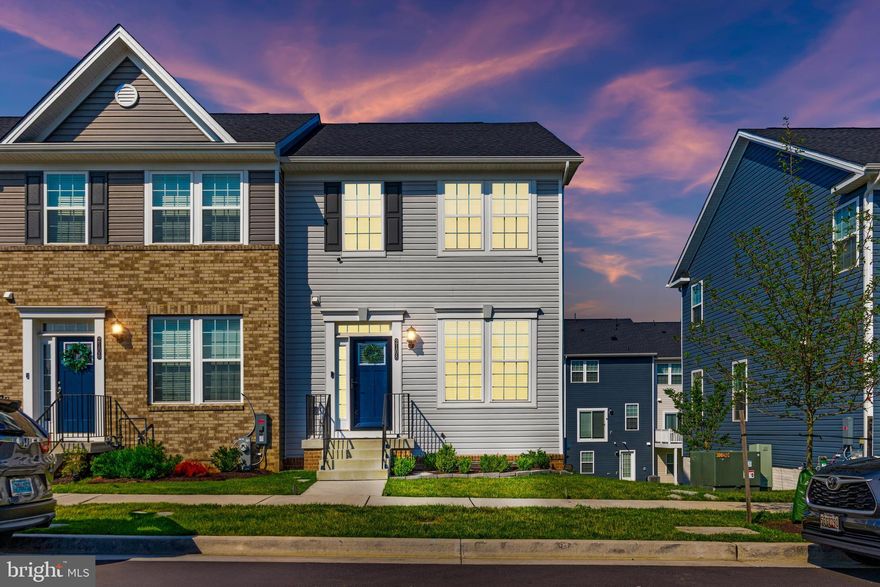 Welcome to 2108 Devine Rd,  an immaculate end-unit townhome built in 2022. This is the upgraded version of townhome living. From the moment you step inside, you’ll notice the thoughtful design and attention to detail that sets this property apart. Crown molding, LVP flooring throughout the main level and basement, and a spacious open layout make this home both functional and beautiful. The heart of the home is the designer kitchen, complete with a glass range hood, tiled backsplash, stainless steel appliances (all just 3 years old), dual wall ovens, a large center island, and a pantry. The electric fireplace adds cozy charm to the living space, and right off the main level, you’ll find a low-maintenance composite deck, perfect for relaxing or entertaining.
Upstairs, the vaulted ceilings give the bedrooms an airy, elevated feel. The home features 3 spacious bedrooms, 2 full baths, and 2 half baths, with a walkout basement offering even more space to spread out.
You’ll love the location too—directly across the street from the community clubhouse, which includes a gym and sparkling inground pool. Additional community perks include a dog park and scenic walking trails.
Compared to the new builds in the neighborhood, this home offers more upgrades, better finishes, and unbeatable value,  without the wait. With all these updates, loads of natural light, and a prime commuter-friendly location, this home checks every box. Don’t miss your chance to own one of the most well-appointed homes in the neighborhood. Schedule your showing today!