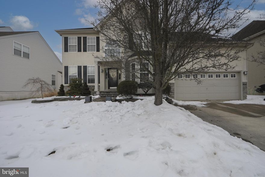 Welcome to this well maintained 4BR/2.5BA home in the desirable Leigh Court community! This spacious property features a 2-car garage, full finished basement, and hardwood flooring throughout the main level. Upon entry, a bright living room flows into the formal dining room—perfect for entertaining. The eat-in kitchen offers tile flooring, center island, stainless steel appliances, and recessed lighting, opening to a soaring family room with vaulted ceiling and cozy fireplace. A versatile bonus room on the main floor—ideal for a home office—along with a powder room and laundry room add convenience.
Upstairs, the expansive primary suite boasts a tray ceiling, walk-in closet, and ensuite bath with dual vanity, soaking tub, and stall shower. Three additional generously sized bedrooms share a hall bath with dual vanity. The finished basement provides a comfortable living area with built-in shelving plus a second entertainment space. Outside, enjoy a large backyard  with patio, hot tub, and full size batting cage ready for relaxing or gatherings. A fantastic opportunity in a sought-after neighborhood—don’t miss it!