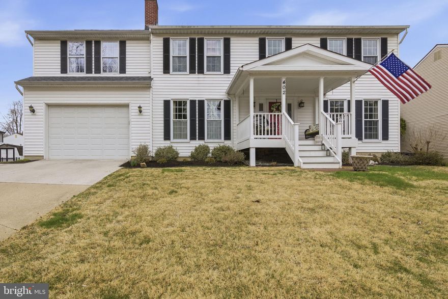 Welcome to this beautifully updated porch-front Colonial single-family home in the sought-after Major's Choice community of Bel Air, just a short walk to downtown restaurants, shopping, schools, and local amenities. This 4-bedroom, 2 full and 2 half bath single-family home offers a 1-car garage and double concrete driveway, along with major renovations that expanded the upper-level living space and added a garage and convenient hallway laundry room. Additional updates include a new roof and new flooring on the stairs and upper-level hallway. Enter through the front door into a welcoming foyer featuring an entry closet and a center hallway with shadow boxing accent trim. The updated kitchen showcases gray shaker-style cabinetry, granite countertops, white tile backsplash, gas cooking, pendant lighting, and a microwave built into the island. A window over the sink fills the space with natural light, while the eat-in table area opens via slider to the Trex deck — perfect for entertaining. Built-in desk and bookcases, and crown molding, add both charm and function. Step down into the living room, which offers recessed lighting, a gas fireplace, a ceiling fan, plantation shutters, garage access, and a slider leading to the screened-in porch, creating a seamless indoor-outdoor flow. Upstairs, you’ll find four spacious bedrooms and two full baths. The hall bath features a large soaking tub, separate shower, dual vanity, and private access to the second bedroom. The primary suite includes two front-facing windows, a ceiling fan, a walk-in closet, and a renovated ensuite bath.  The additional bedrooms offer ceiling fans and double closets. The upper-level hallway laundry room adds everyday convenience. The fully finished lower level provides additional living space and a half bath, ideal for recreation, guests, or a home office. Outdoor living is just as inviting with a rear yard,  a screened-in porch, and a Trex deck — perfect for relaxing or hosting gatherings. Move-in ready and ideally located, this home offers space, style, and walkability in the heart of Bel Air.
