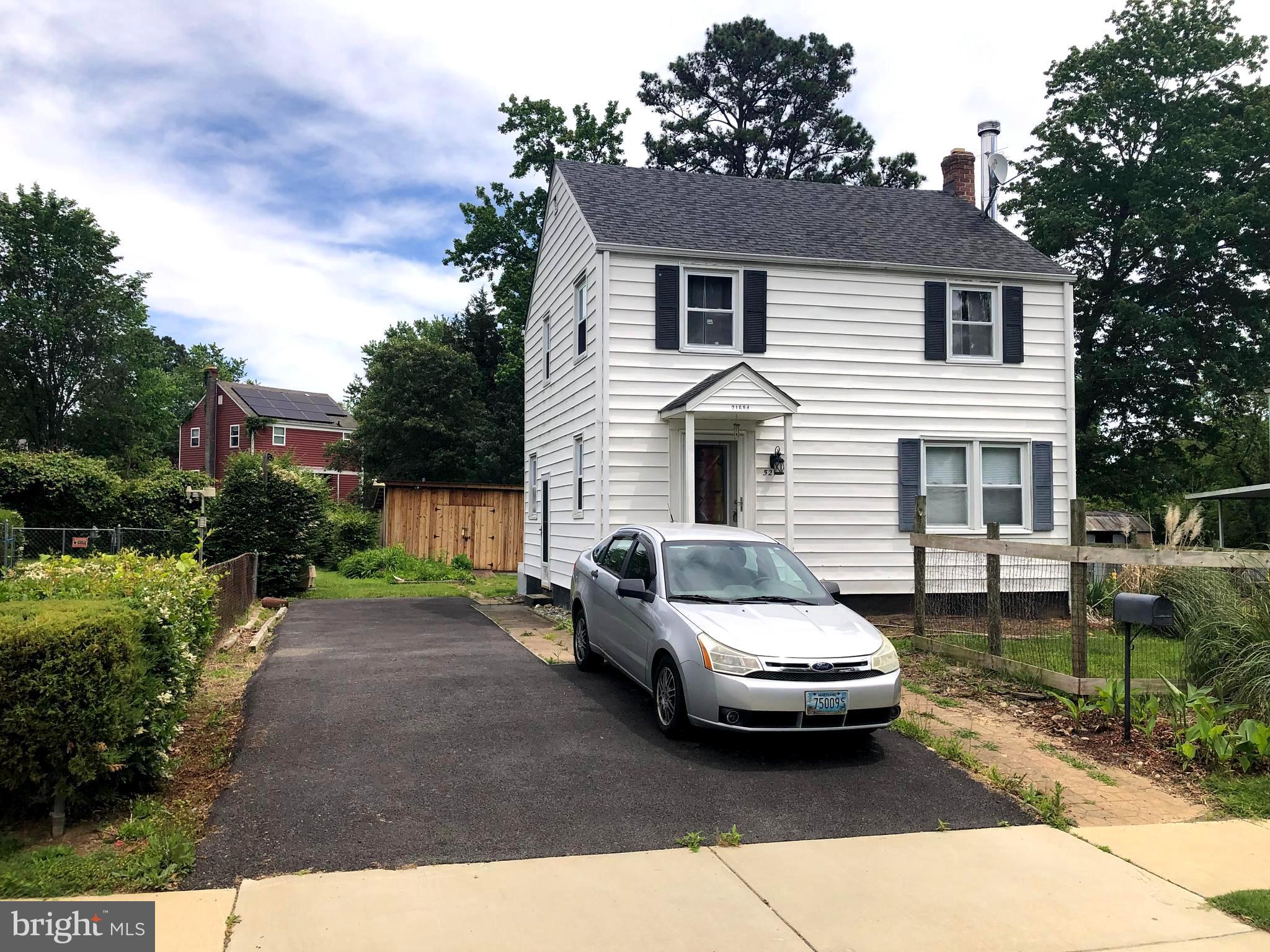 "Very Affordable"... and "Move In Ready"... this 3 bedroom 1 bath Home in the Patuxent Park neighborhood is in Good Condition and ready for new ownership. "SOLD AS IS" . Owned by the same family since it was built, this property has a very nice yard for gardening, relaxing and enjoying the outdoors. Included is a Large wooden shed for all of your storage needs. There is a nice flat Paved driveway with parking for 3+ vehicles or an RV and has a side door entrance into the house and kitchen. Living room has wood paneling, sitting area and a wood burning stove area with tile flooring. Dining room has custom built in cabinets and knotty pine wood wall panels and includes table and chairs. Kitchen has upgraded countertops, recently added refrigerator and dishwasher, rolling island, and a gas range that needs repair or replacement. Stairs from the kitchen lead down to the basement and laundry area and also outside to driveway. Stairs in LR lead up to 2nd floor with 3 bedrooms and 1 full bath. Attic access is available with pull down stairs in hallway. NEW gas heating system installed 2024. The Patuxent Park Neighborhood is Conveniently located to nearby County Parks and playgrounds, Shopping, Dining, Entertainment, Pax River Naval Air Station and The Best that Southern Maryland has to offer. Estate Sale. Third party Court Approval may be required