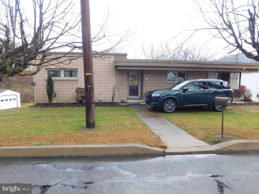 move right into this 2 or 3 bedroom ranch home; close to 322; large living room,. 2 car garage with a very large parking area; garage is heated!!