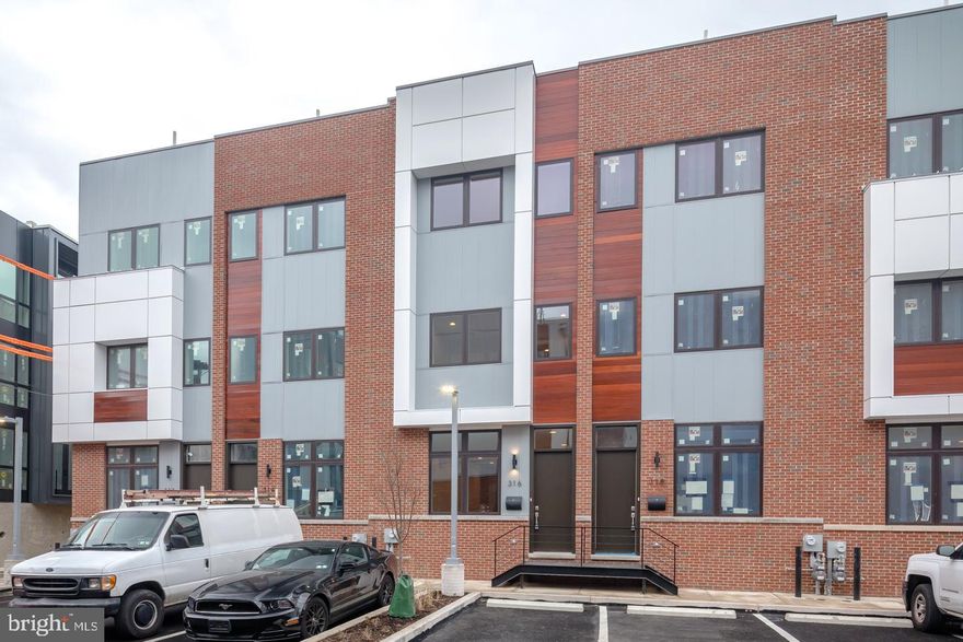 Introducing SoNo26, a premier living destination in Philadelphia?s Northern Liberties. Our unique townhomes offer an exciting opportunity to enjoy luxury living while being in the center of all the city has to offer. Stroll and shop along Liberty Walk or enjoy a gourmet meal at one of the critically acclaimed restaurants, bars and cafes. The homes at SoNo26 feature all of the high quality finishes you?ve come to expect from a Premier Access property. Step inside your front door and you will be greeted with a spacious open concept living and dining area with beautifully designed windows that offer magnificent natural sunlight. The living area flows nicely into the top of the line gourmet kitchen which features Arctic Quartz countertops, Bosch appliances and custom cabinets making this kitchen the perfect space to entertain friends. Open the sliding glass doors and you will find your back patio where you can enjoy your morning cup of coffee or glass of wine after dinner. Leading off of the kitchen are stairs to take you down to your full finished basement with washer and dryer and half bath giving you a great added space for guests or an entertainment center. Head back up the stairs and continue to the second floor where you will find two spacious bedrooms with large closets and plenty of storage as well as two bathrooms for your convenience. On the upper floor you will enter into the large master suite with incredible walk in closets and master bath with double sinks that will make you feel right at home. On the top floor you will find your unbelievable roof deck that offers spectacular views of the Philadelphia skyline making this a relaxing at home retreat. To add on to all that SoNo26 has to offer, each unit comes with 1 car parking to ensure you never have a problem finding a space for your car.