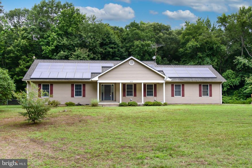 Property has 1.68 acres, plenty of room for the avid gardener.  Secure fenced in back yard for the four legged babies, makes this even better.  There is a deck in the back yard with an entrance into the kitchen/dining area.  Three bedrooms, with an updated primary bathroom and a large shower stall make access easy.    Easy home to maintain.  There are steps in the garage leading up to a large story area that is the length of the house.   It has subflooring in place, and the ability to finish it off is there.  Nice wide porch to welcome you from the front side walk.  The two car garage has space for a work shop.   Easy to show!  The property is an estate and for that reason is being sold AS IS.  PR is trying to get more information from Tesla on the Solar City Agreement.