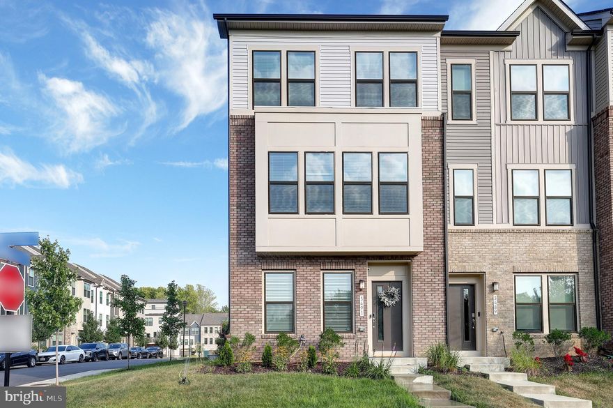 3491 Cormorant Drive - Remarks 

Welcome to this exquisite 2021 Pulte built Frankton model, a sophisticated  smart end-of-group townhome that embodies contemporary elegance and modern luxury in the brand-new Watershed community in Laurel, MD. The inviting front exterior boasts an outdoor courtyard, perfect for relaxation with seating areas that offer a serene retreat. The contemporary style brick water table enhances the sophisticated curb appeal of this remarkable home. Step into a sun-drenched foyer featuring luxury vinyl plank (LVP) flooring that sets the tone for the refined interiors. The entry-level recreational room is versatile, easily transformed into an additional bedroom if needed. The coat closet provides ample storage. The entry to the two-car garage reveals, a window for natural light, and a garage door opener for convenience. Ascend the hardwood stairs to your sunlit main level adorned with LVP flooring throughout. The chef’s dream kitchen features a gas-powered kitchen package, upgraded stainless steel appliances, 42” Snow White cabinets, and an enlarged quartz island bathed in natural light from surrounding windows. Recessed lights add a modern touch, and the private entry to the TRX Deck is perfect for outdoor dining and relaxation. The dining area offers luxurious glass built-ins to showcase any special momentos and recessed lighting throughout. The great room, with Leveler window treatments, benefits from the abundant light provided by this end-unit layout. A discreetly positioned half bathroom near the staircase ensures optimal privacy. The upper level is a sanctuary of comfort and style. The owner’s suite oasis features plush carpeting, a walk-in closet, and an ensuite bathroom with double vanity quartz countertops, tiled flooring, a frameless shower, and a private water room. Two additional bedrooms, a convenient laundry room, and a full bathroom with a tub shower and cultured marble countertops complete this level. The rear exterior includes a two-car garage, providing ample space and functionality. Nestled in Watershed, a vibrant community in the heart of Laurel, MD, offering a perfect blend of luxurious amenities — this brand-new neighborhood ensures easy access to amenities, situated just 11 minutes from BWI and near major employers like NSA and Fort Meade. Residents enjoy recreational opportunities with nearby parks, walking trails, shopping centers, and entertainment venues, including Arundel Mills Mall and Maryland Live! Casino. Designed for community and connectivity, Watershed features landscaped green spaces, playgrounds, and picnic areas, and is served with pools and dog parks! With convenient transportation options to Washington, D.C., and Baltimore, Watershed provides a serene, well-connected experience. Make Watershed your new home and enjoy!