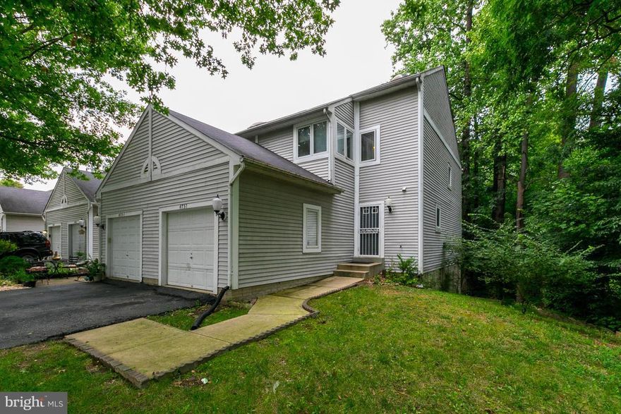 End unit townhome with its own driveway, and one car garage.  This home is move-in ready!!  Fresh paint, updated flooring and all brand new ENERGY EFFICIENT windows throughout the house.  Just minutes from the MGM Grand/National Harbor, and Tangier Outlets.  Easy and quick commute to DC, and military bases.  This home backs to the wooded area for additional privacy.