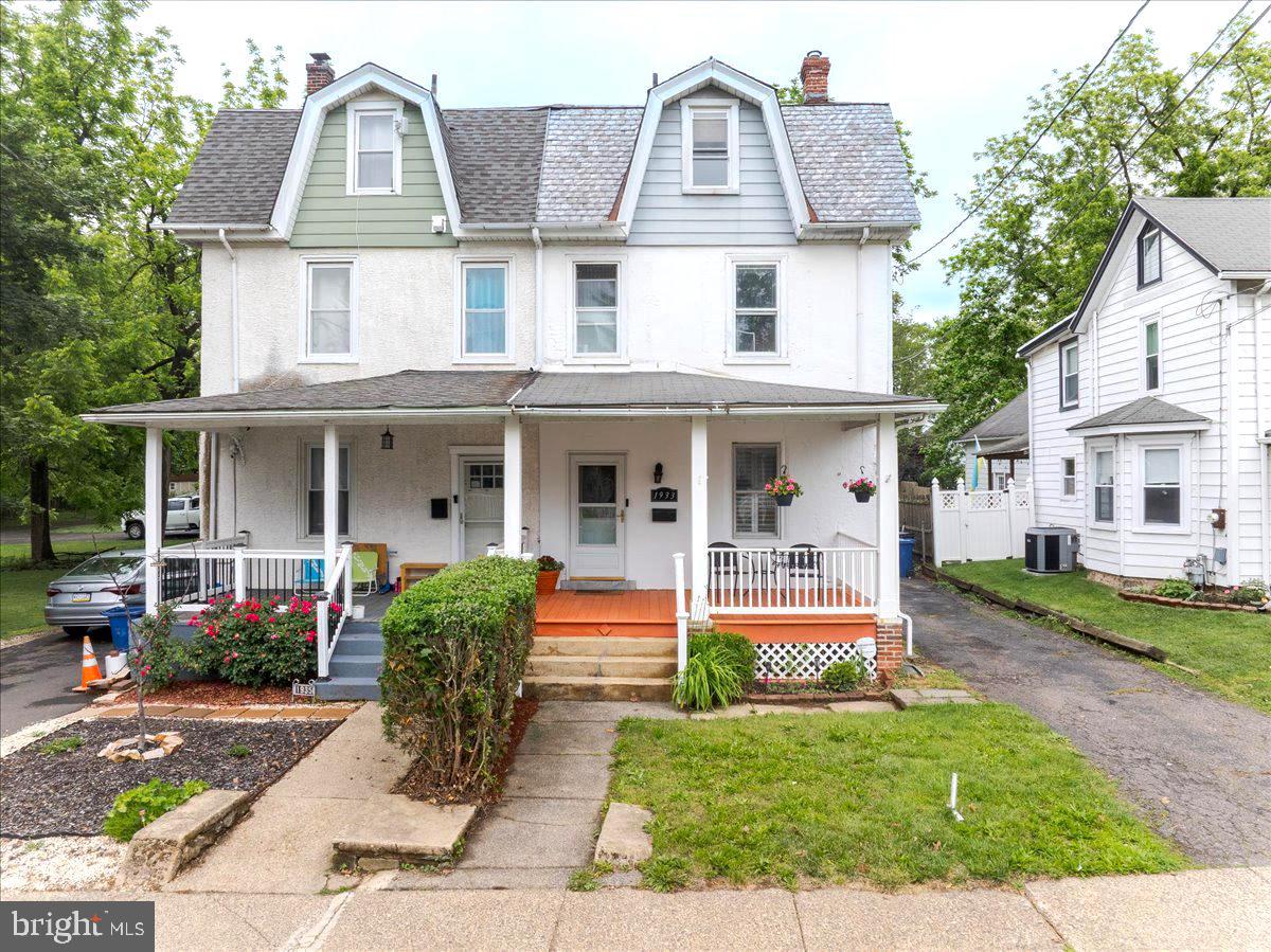 Welcome to this beautifully updated 4-bedroom, 2.5-bath Colonial twin home offering the perfect blend of classic charm and modern upgrades. Step onto the inviting front porch and into a spacious interior featuring parquet wood floors, 9' ceilings, a newer kitchen with 42" designer white cabinets, black stainless appliances, granite tops, tile floor and stylish finishes. 3 spacious bedrooms with remodeled full bath on second level and a master suite complete with Jacuzzi tup on the 3rd level. Enjoy year-round comfort with central air and efficient gas heat. This home also offers a full basement for added storage or potential living space, and off-street parking for your convenience. Don’t miss the opportunity to own this move-in ready gem—schedule your showing today!