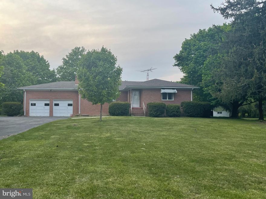 Bring your ideas!  This quaint 3 bedroom, 1 bath brick rancher with a full unfinished basement has retro charm and is just waiting for a new owner to unlock its true potential! The large level 1.9 acre yard provides plenty of space for all of your outdoor needs and the large covered back porch makes it easy to entertain your guests regardless of the weather.   Features include a spacious living room with a cozy fireplace and built in planter, open kitchen/dining area, 2 car attached garage with storage space and attic access, shed, paved driveway, and a park like setting with mature trees and landscaping.  Conveniently located just 10 minutes from I-81.