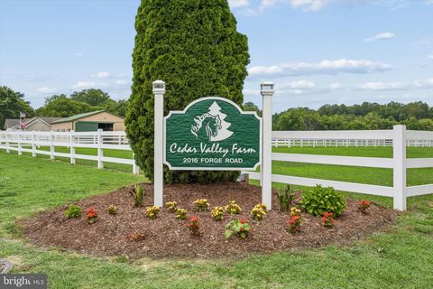 Photo of 2016 Forge Road, TOANO, VA 23168 (MLS # VAJC2000694)